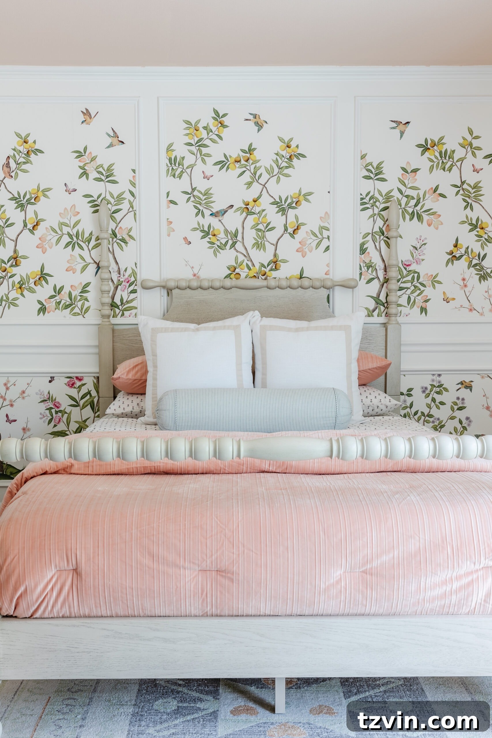 little girls bedroom with pink bedding and chinoiserie wallpaper