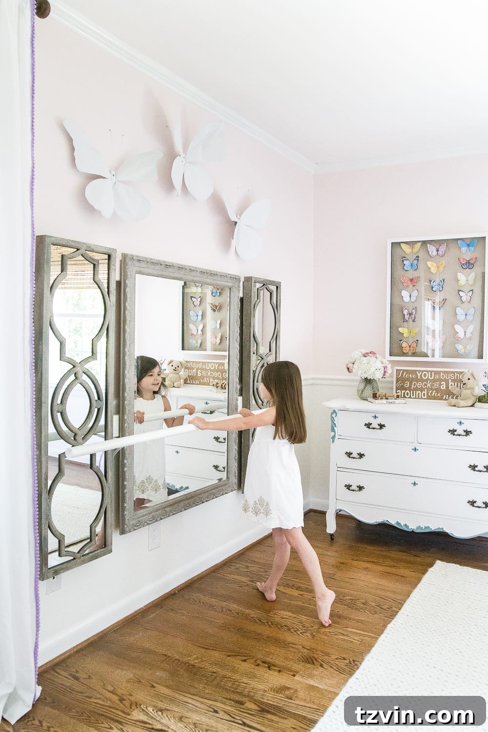 Transforming Kids' Spaces: 24 Brilliant Storage & Decor Solutions 18 DIY ballet barre in a little girls room with butterfly art
