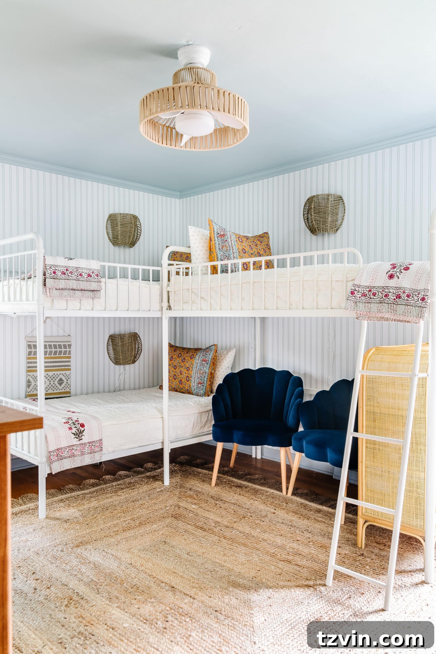 Transforming Kids' Spaces: 24 Brilliant Storage & Decor Solutions 34 coastal bunk room for 3 girls with blue ceiling in Romabio Carolina Sky and green striped wallpaper