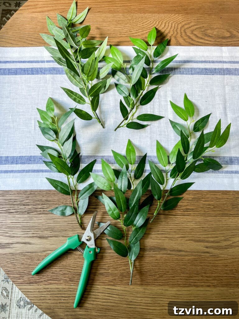 cutting ruscus to use in a vase arrangement
