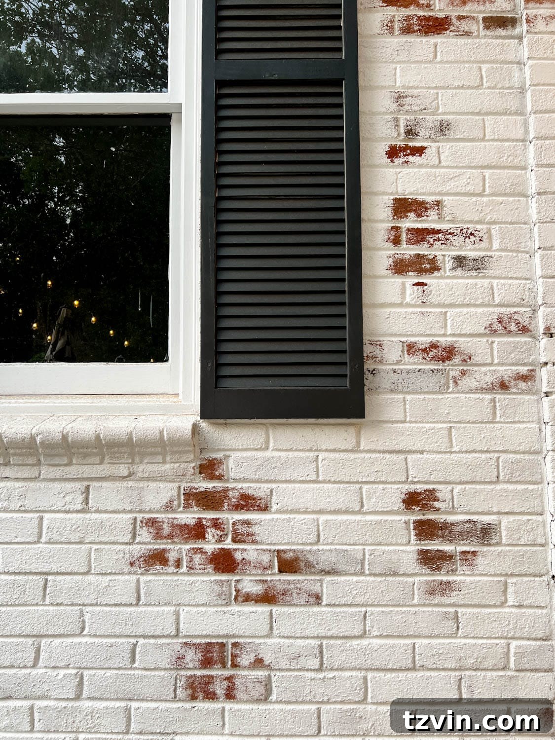 Mastering Limewashed Brick Cleaning and Upkeep 6 white limewashed brick and black shutters