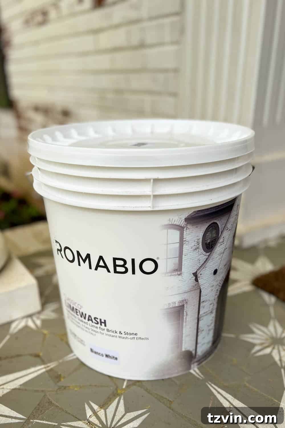 Mastering Limewashed Brick Cleaning and Upkeep 7 4 gallon bucket of Romabio Classico Limewash in Bianco White