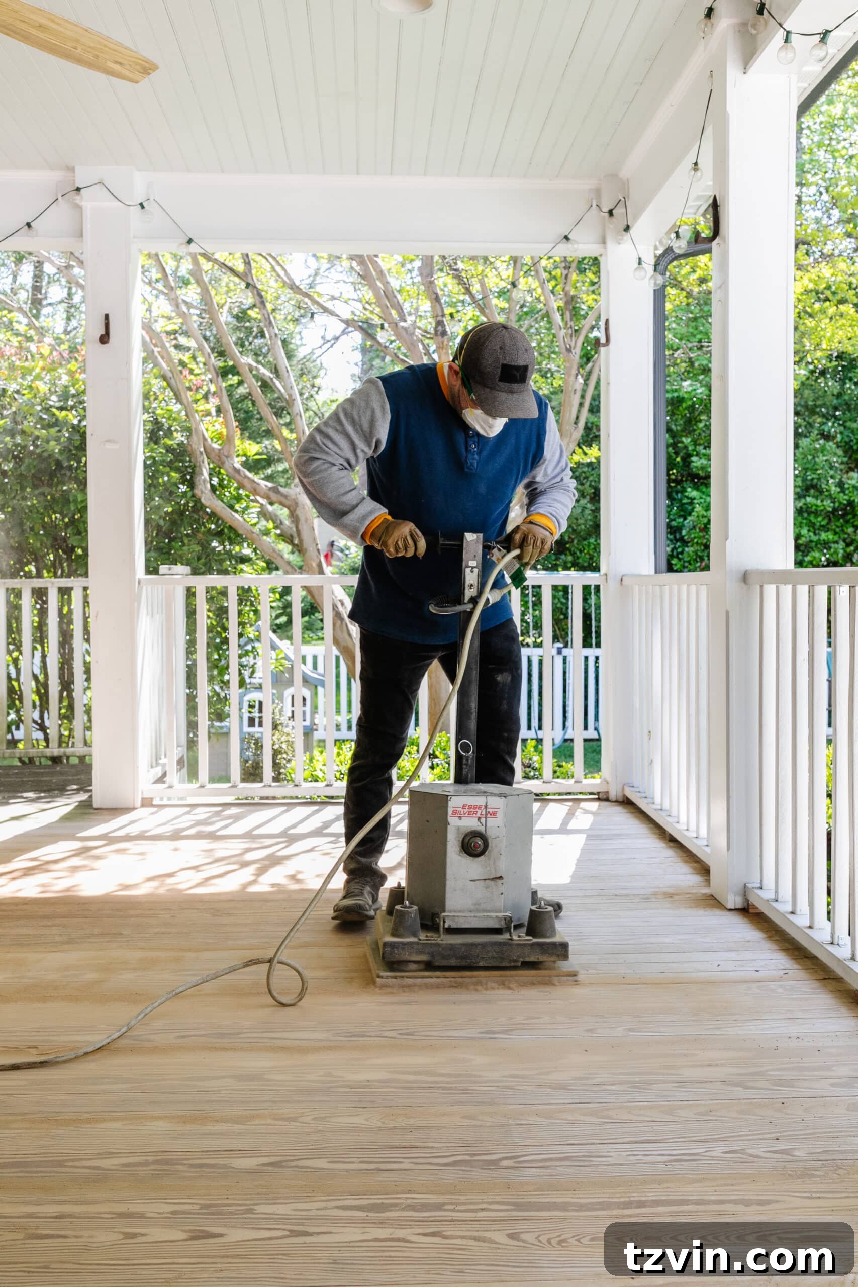 Finding Your Perfect Neutral Driftwood Deck Stain 4 sanding a wood deck with an orbital floor sander