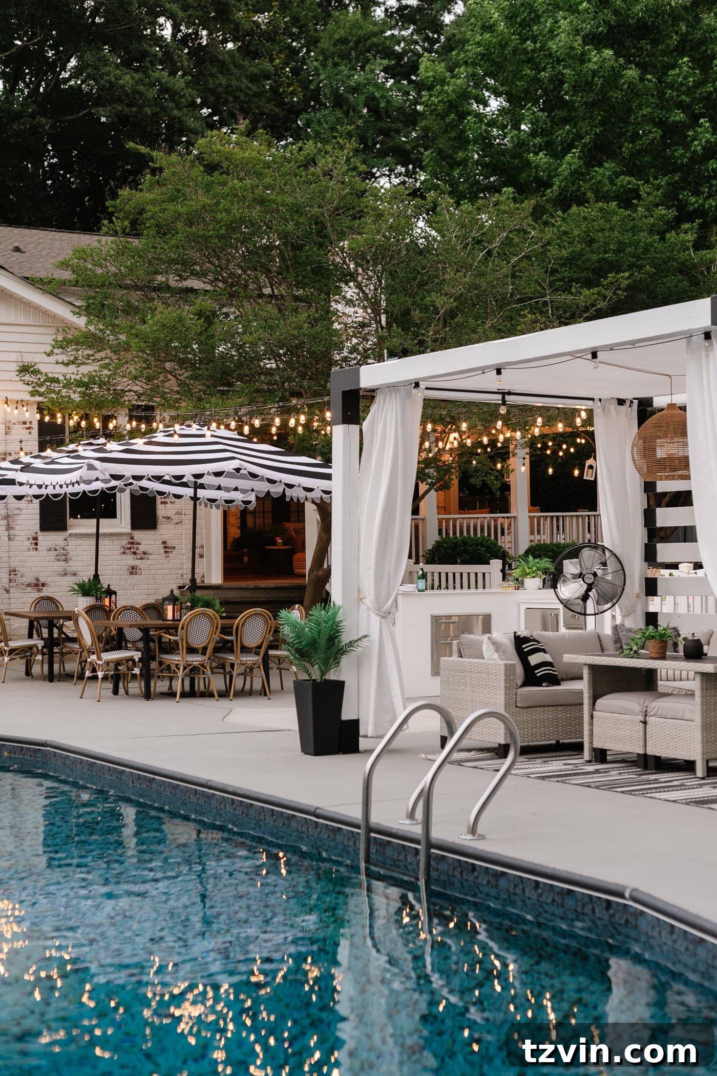 backyard pool with DIY cabana and string lights