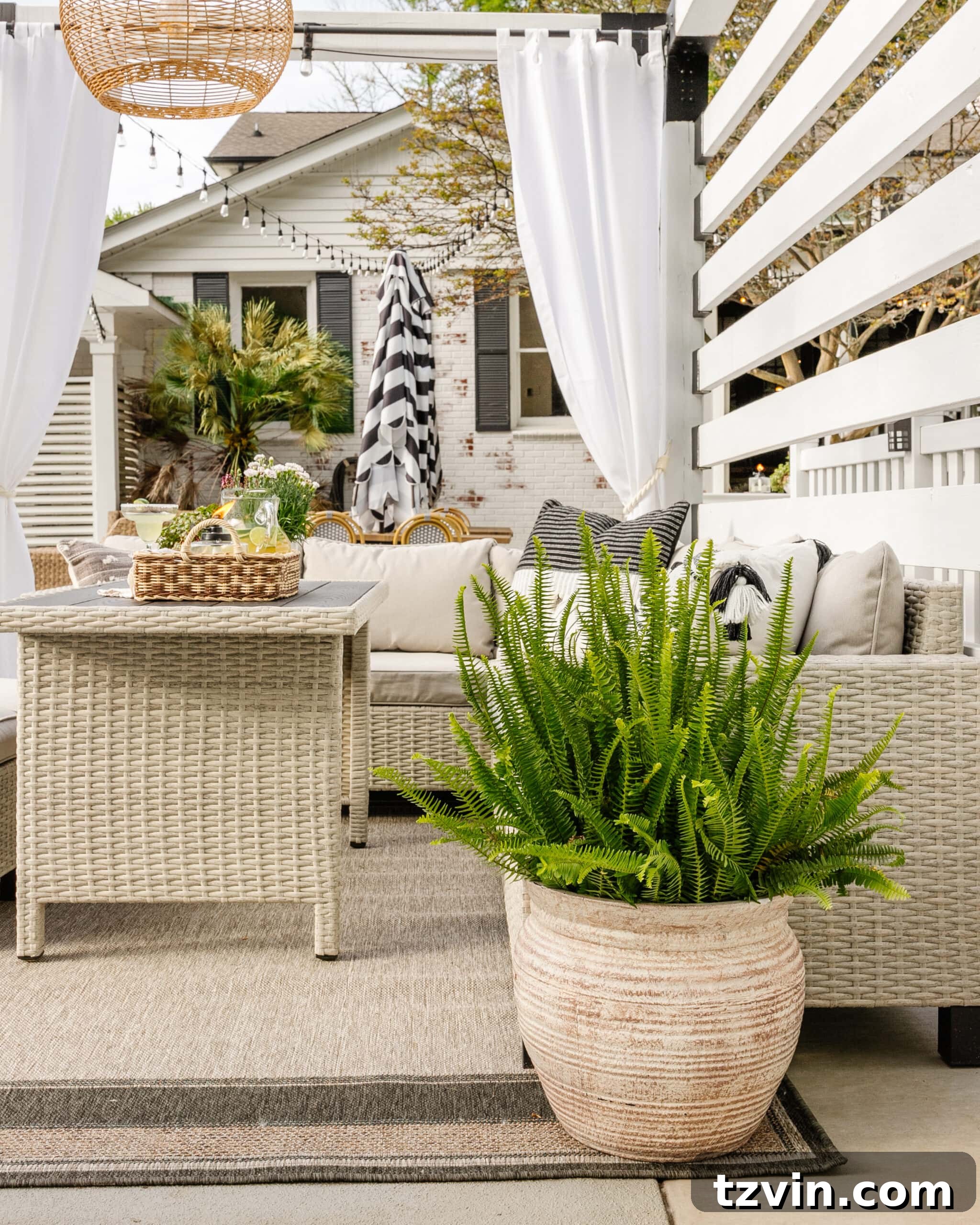 backyard cabana with outdoor dining set