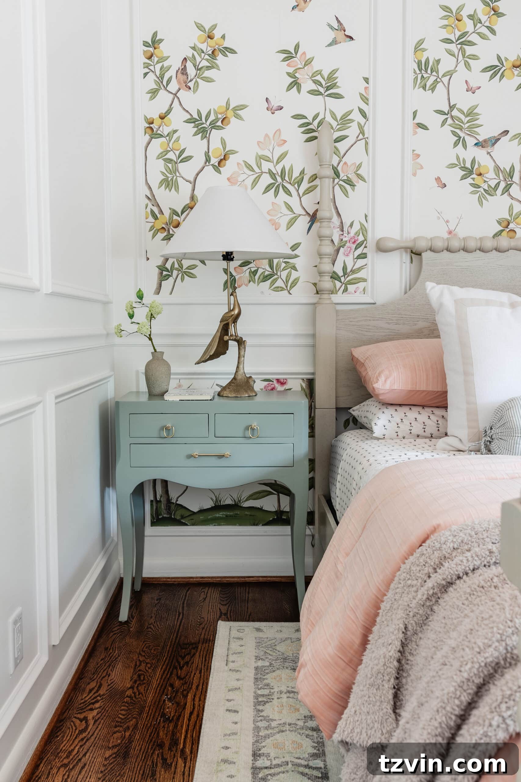 Close-up of a peacock table lamp resting on a newly gloss-painted mint green bedside table, showcasing the smooth, reflective finish in a little girl's room.