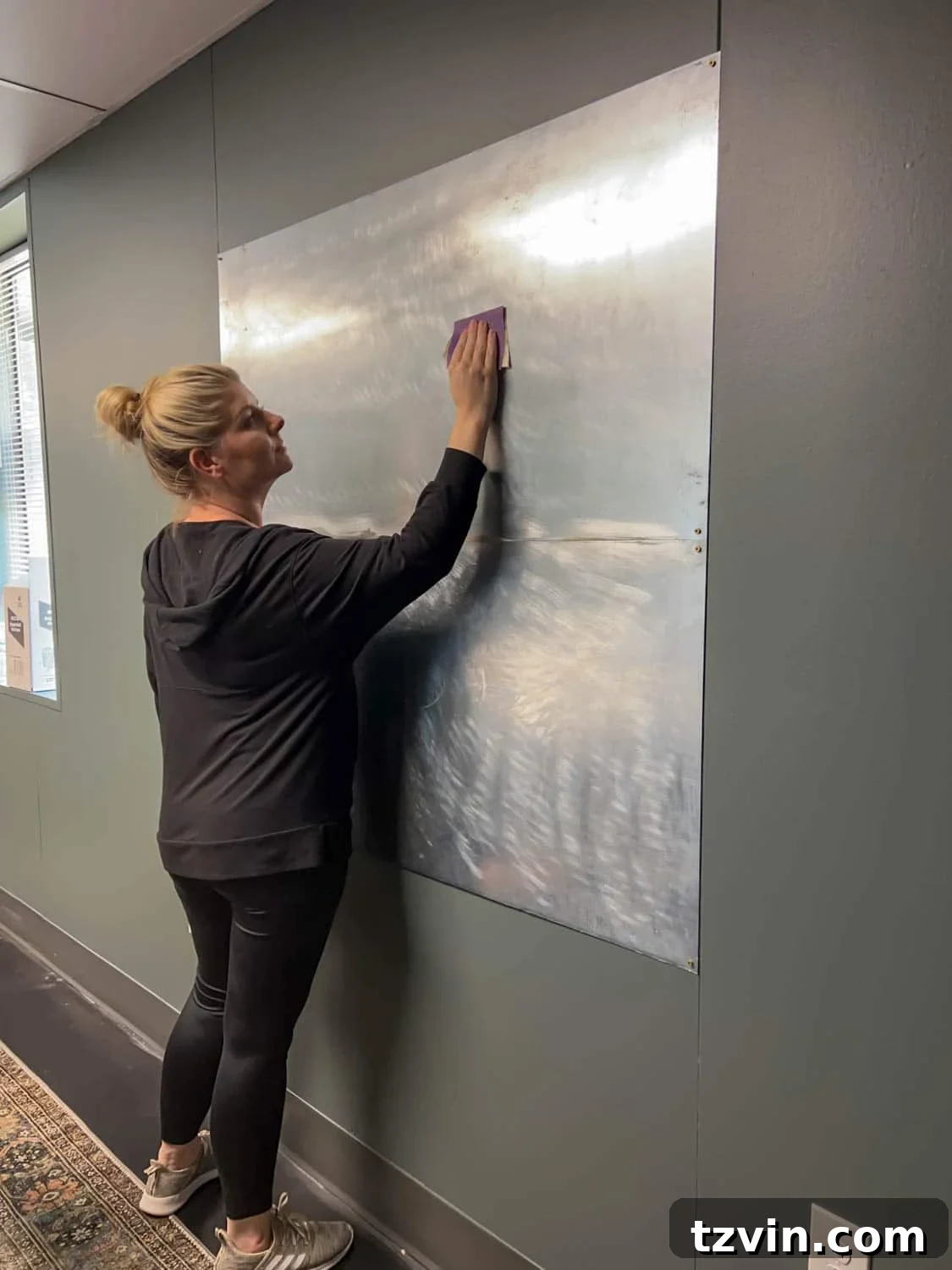 Statement DIY Magnetic Art & Message Board 10 sanding metal sheets on a wall to apply a mural as DIY art