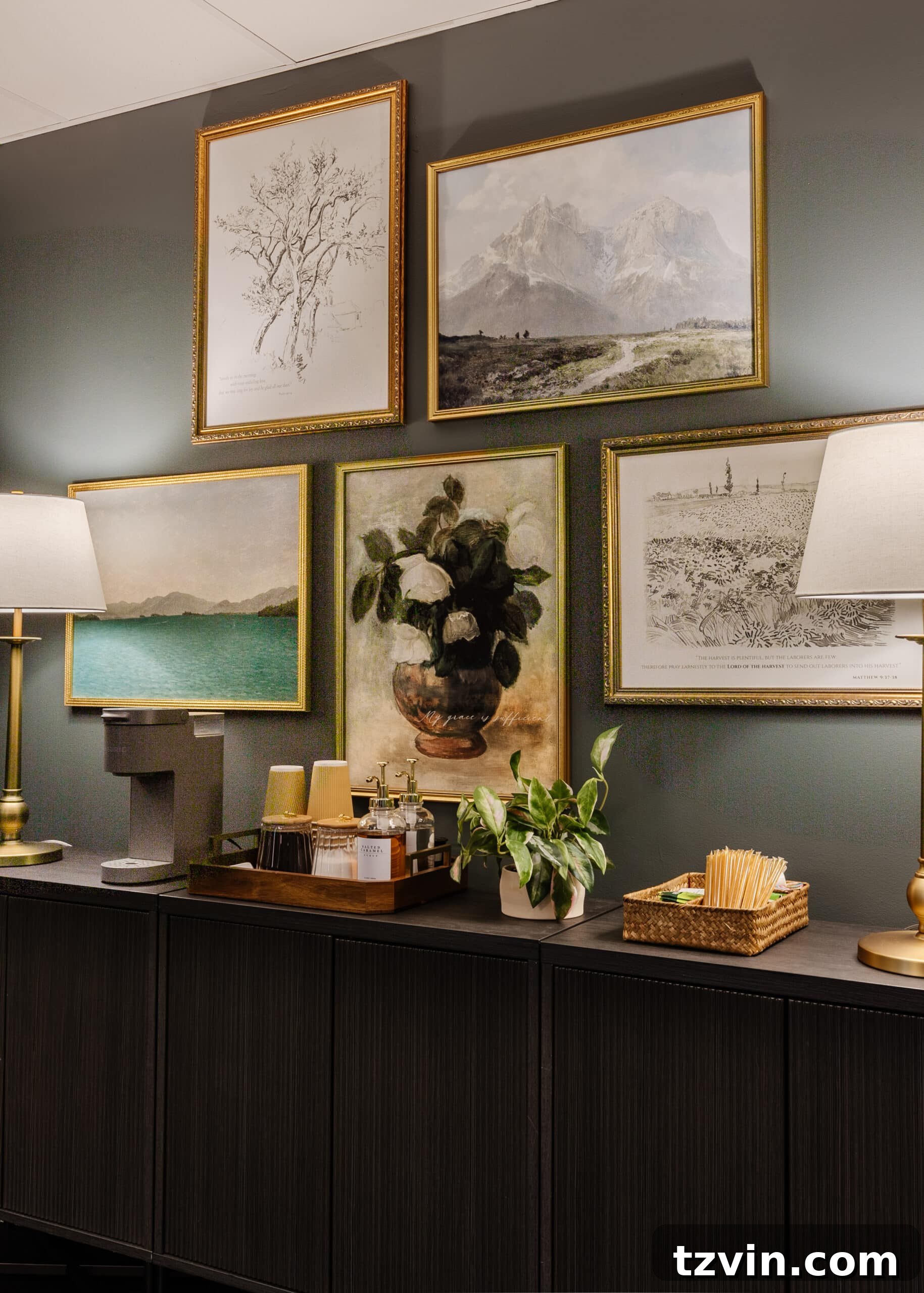 Warm Up Your Workday Cozy Conference Room Ideas for an Office Refresh 20 A beautifully curated gallery wall above a sideboard and coffee station in a conference room, adding personality and artistic flair.