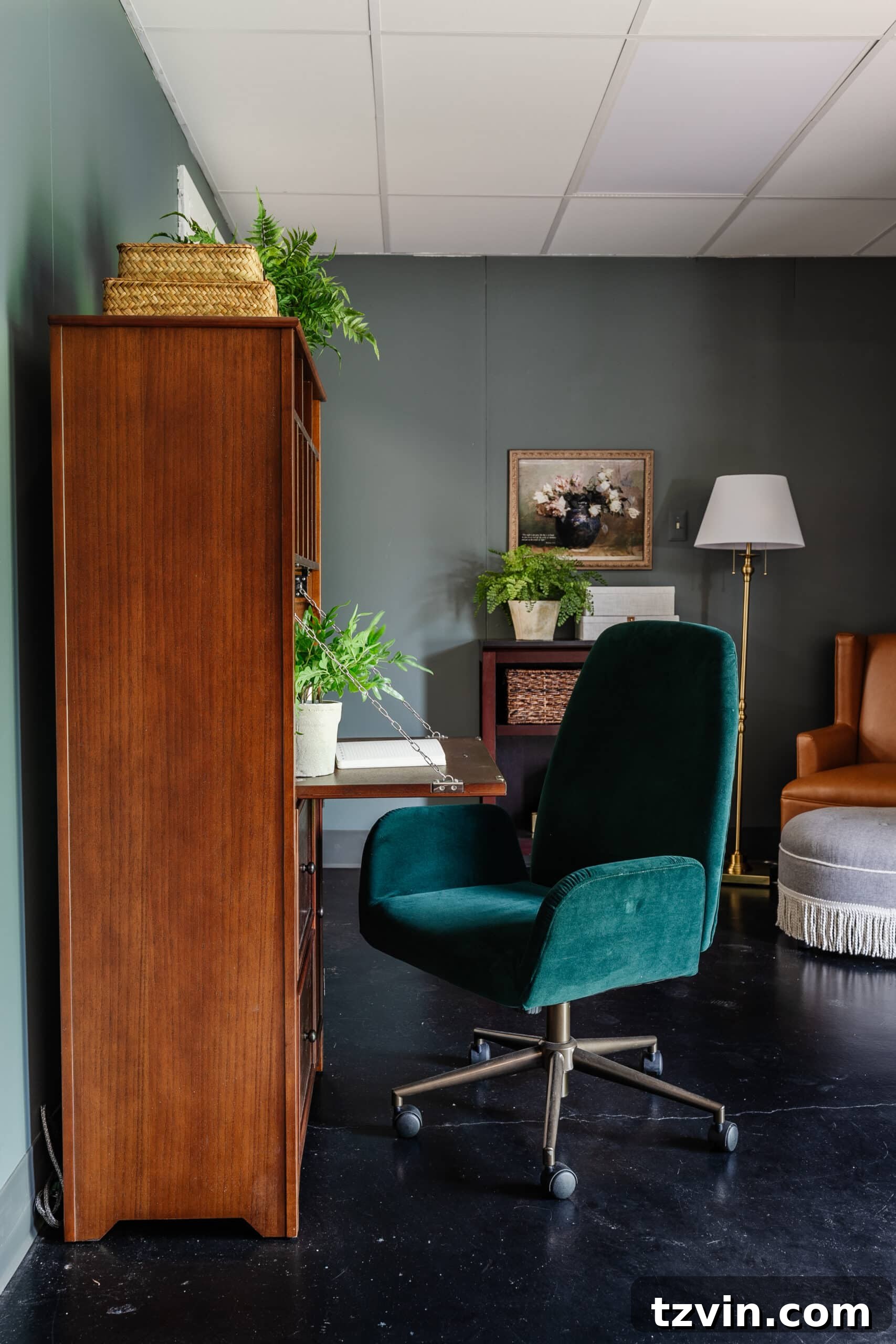 Warm Up Your Workday Cozy Conference Room Ideas for an Office Refresh 5 Elegant wooden secretary desk paired with a stylish green desk chair in a newly designed office space, maximizing functionality.