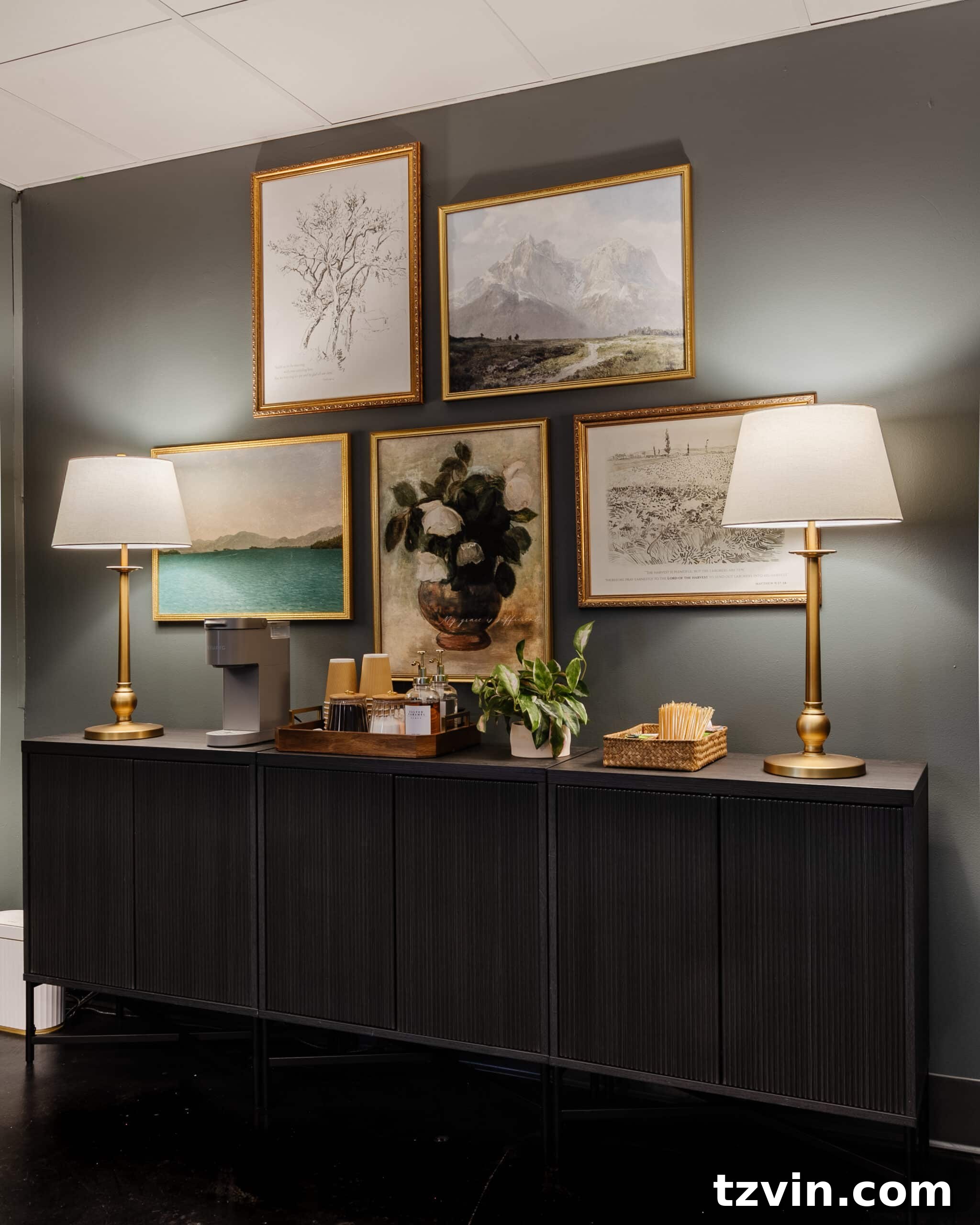 Warm Up Your Workday Cozy Conference Room Ideas for an Office Refresh 7 Stylish conference room featuring a custom-look sideboard created from multiple accent cabinets, adorned with a gallery wall and a convenient coffee station.