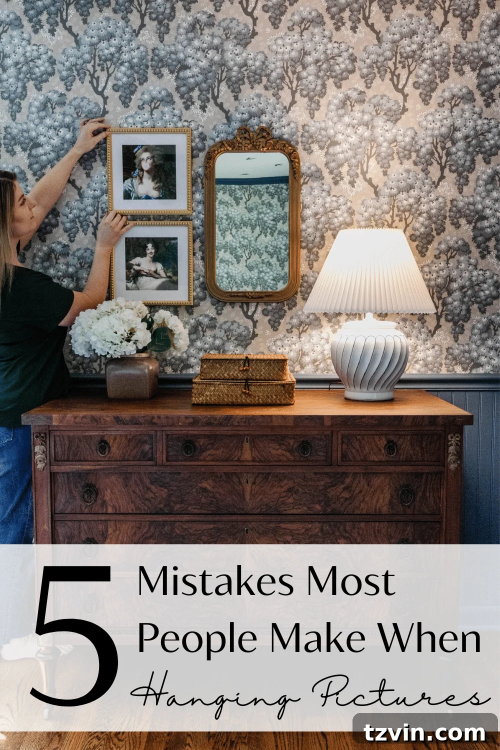 Hang Frames Perfectly Avoid These Common Errors 2 Expert tips for arranging pictures on a wall, including optimal height for frames and gallery walls, and achieving correct scale.