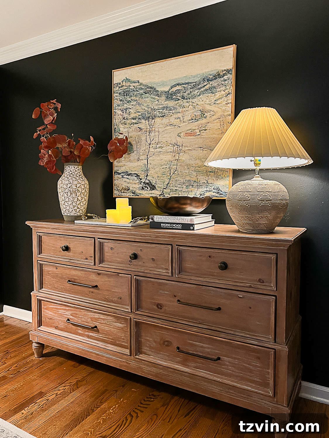 Hang Frames Perfectly Avoid These Common Errors 14 A DIY art piece perfectly scaled and hung above a dresser, demonstrating ideal proportion in a bedroom.