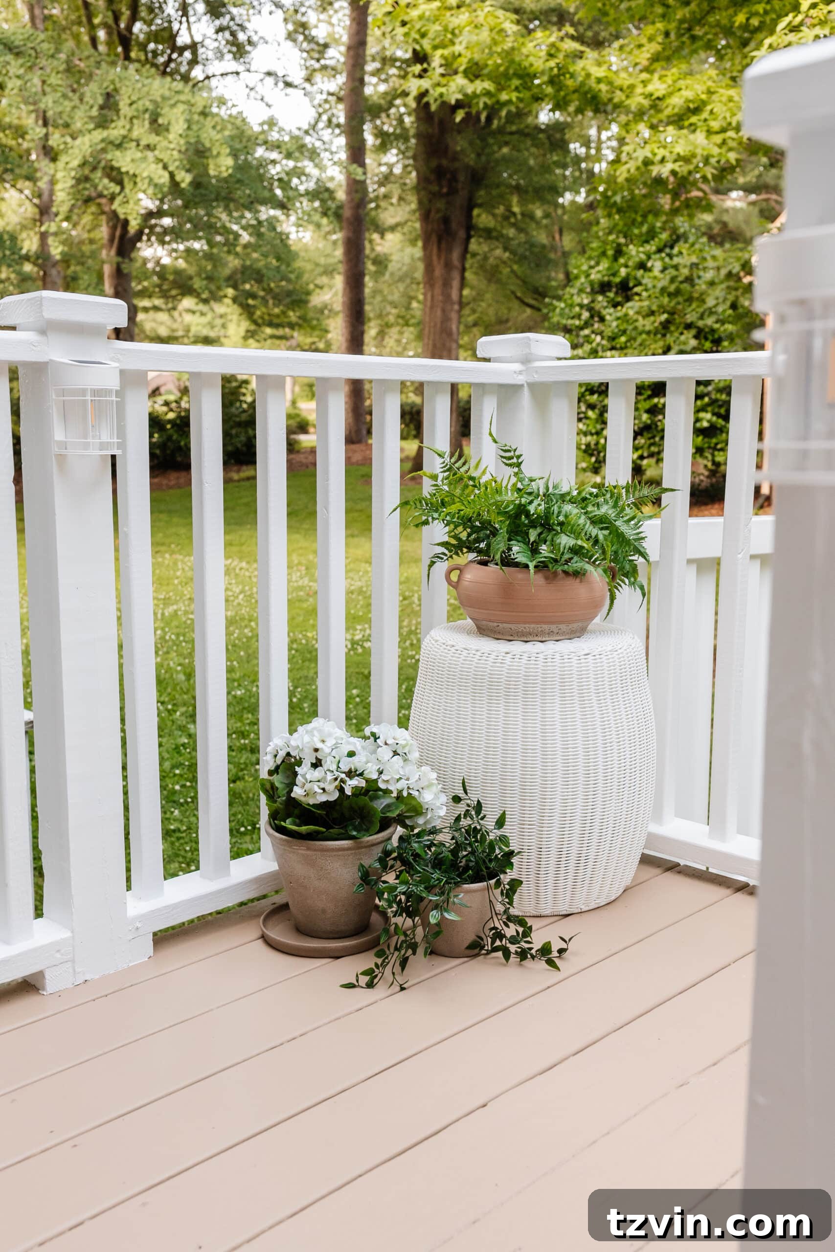 6 Small Side Porch Makeover Ideas for Instant Charm 11 woven outdoor end table with planters on a deck