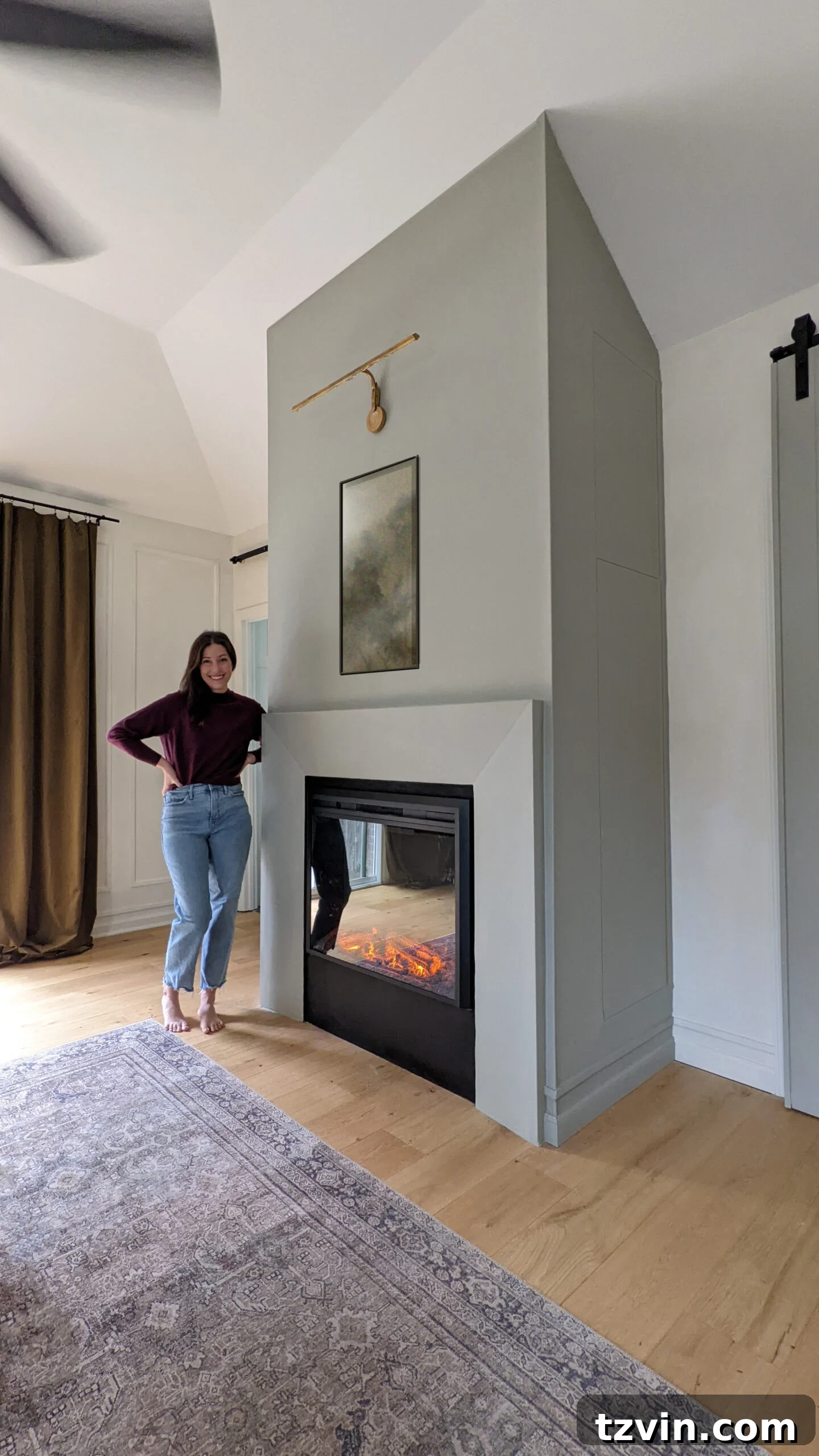 DIY Fireplace Creations for Any Space 14 A stylish DIY electric fireplace featuring cleverly disguised hidden cabinets on its sides for discreet storage.