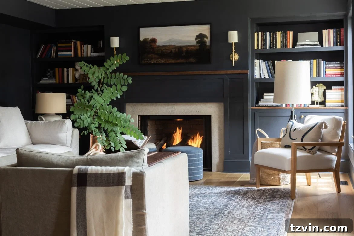 DIY Fireplace Creations for Any Space 15 A sophisticated semi-DIY gas fireplace with a navy blue accent wall, offering a warm and inviting atmosphere.
