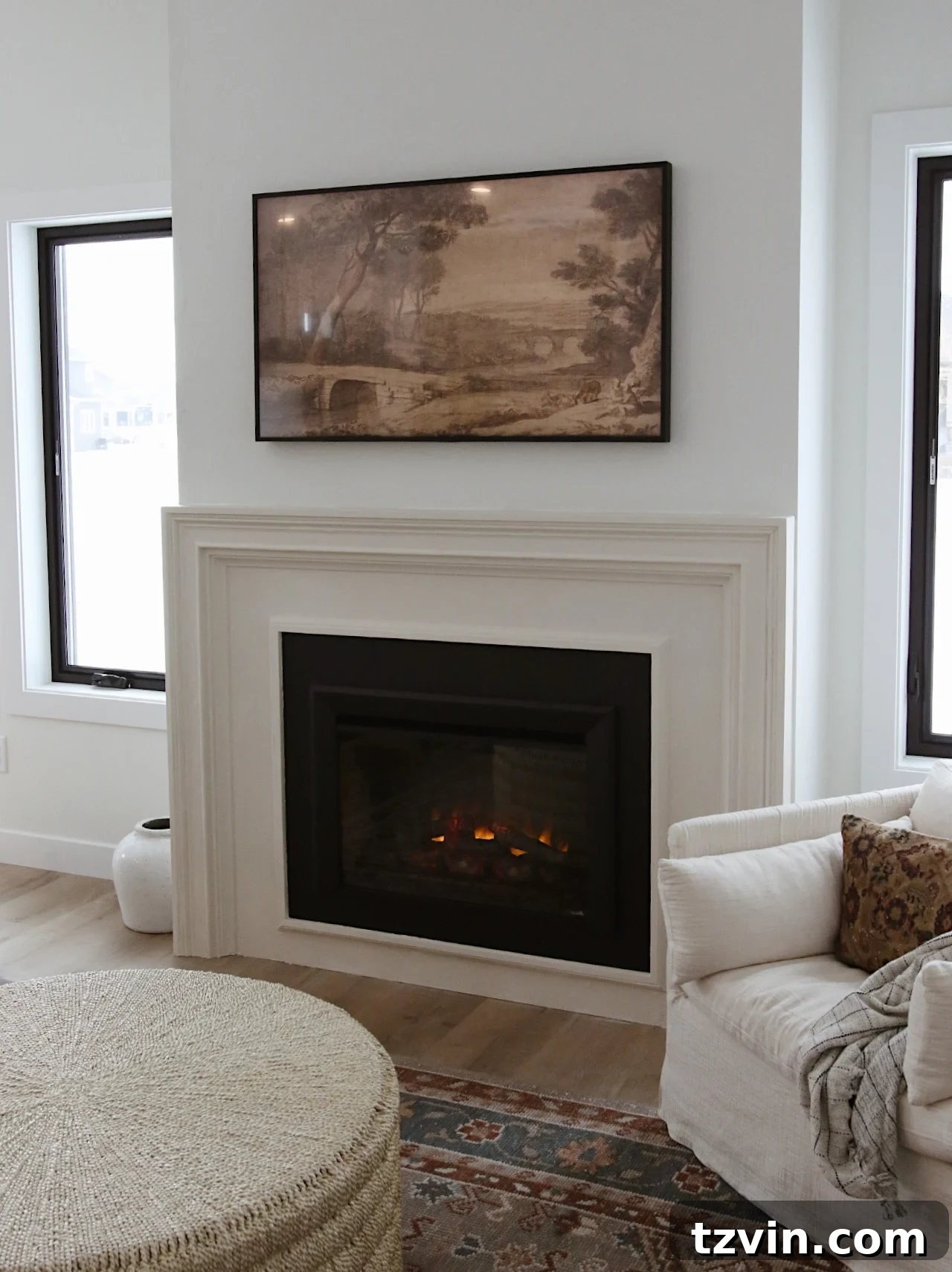 DIY Fireplace Creations for Any Space 5 A minimalist DIY faux plaster fireplace surround with subtle texture.