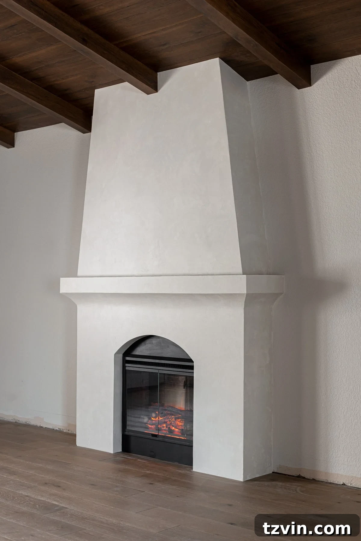 DIY Fireplace Creations for Any Space 8 An elegant built-in electric fireplace finished with authentic Venetian plaster.