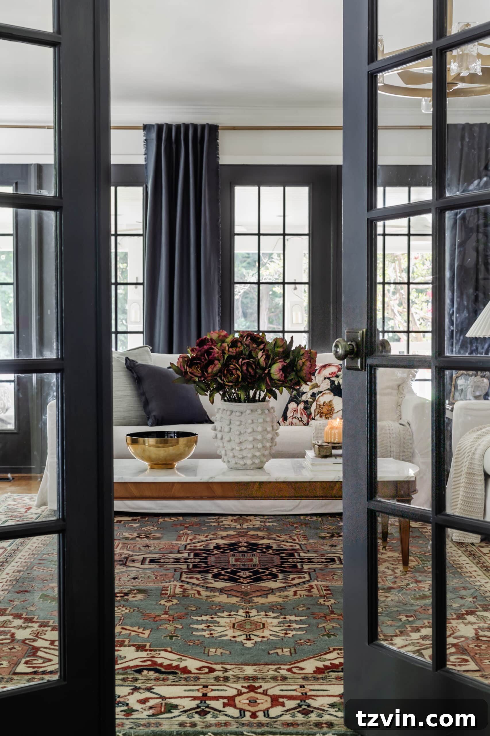 french doors leading into a living room decorated for fall