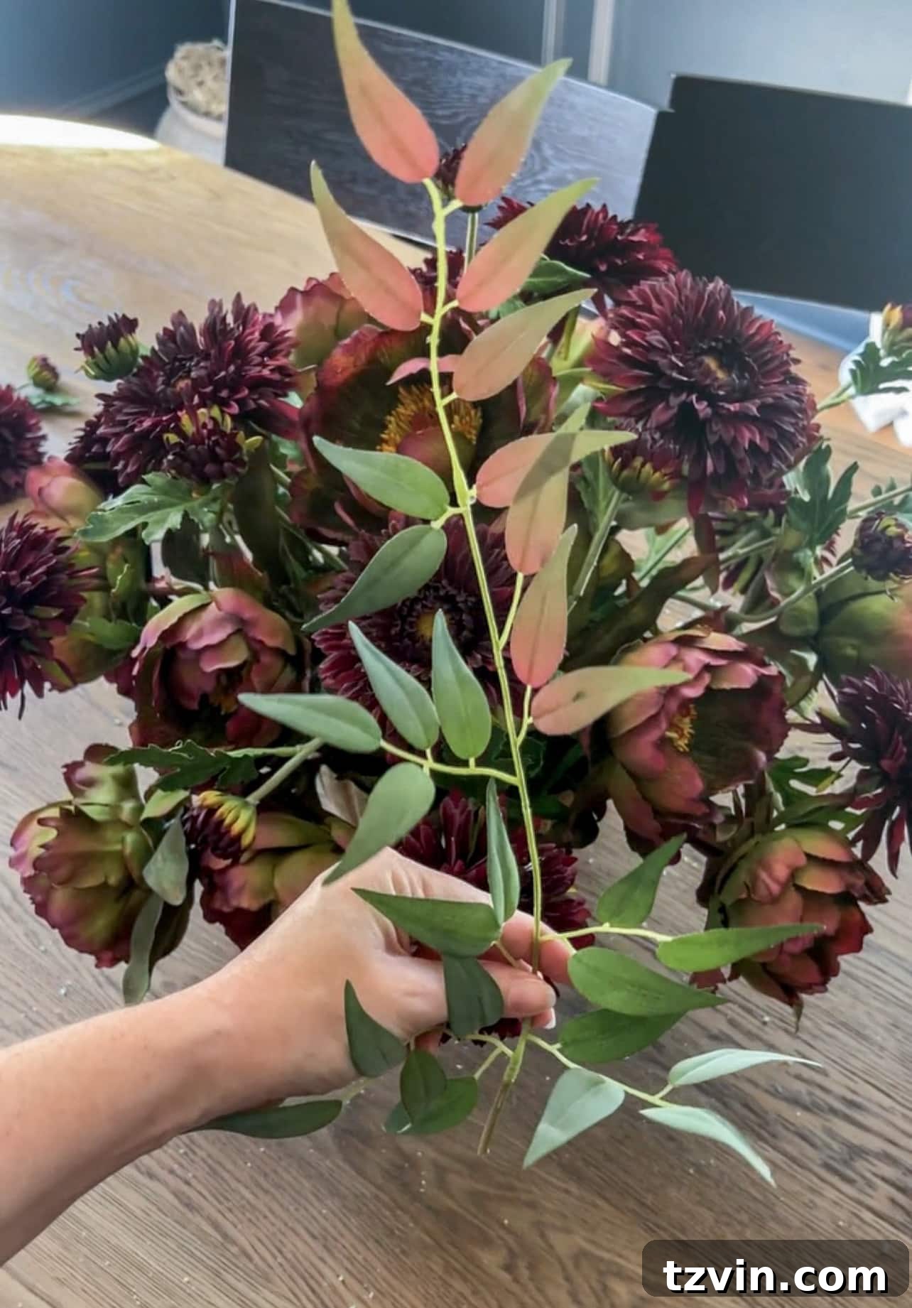Your Guide to Crafting Beautiful Fall Floral Arrangements 11 Mauve and green Italian ruscus from Afloral, used as the chosen greenery filler