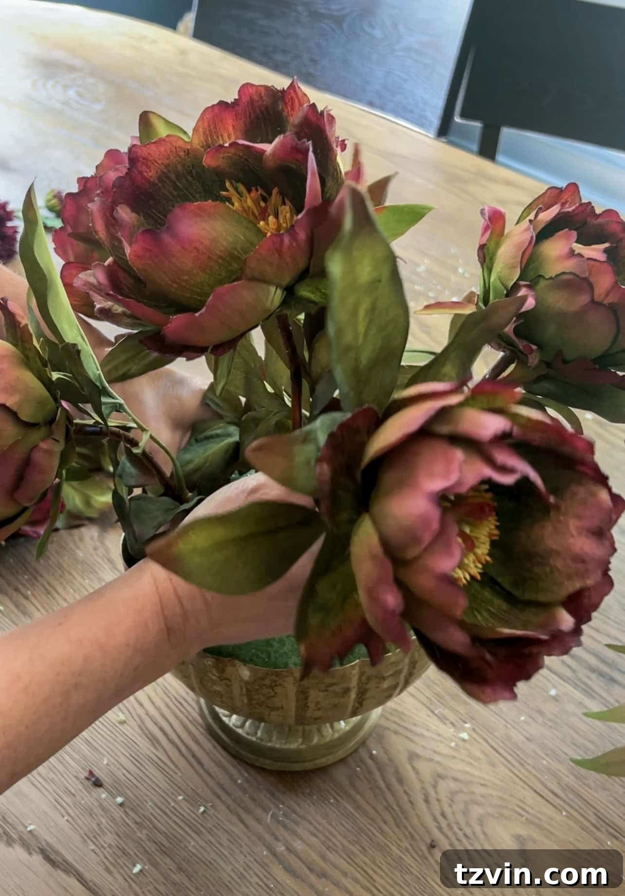 Your Guide to Crafting Beautiful Fall Floral Arrangements 7 Using peonies to establish the outer shape of a fall floral arrangement