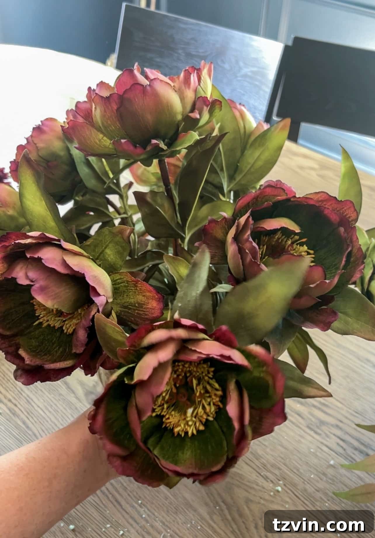 Your Guide to Crafting Beautiful Fall Floral Arrangements 8 Purple and green peonies from Afloral used to complete the primary flower layer of the arrangement
