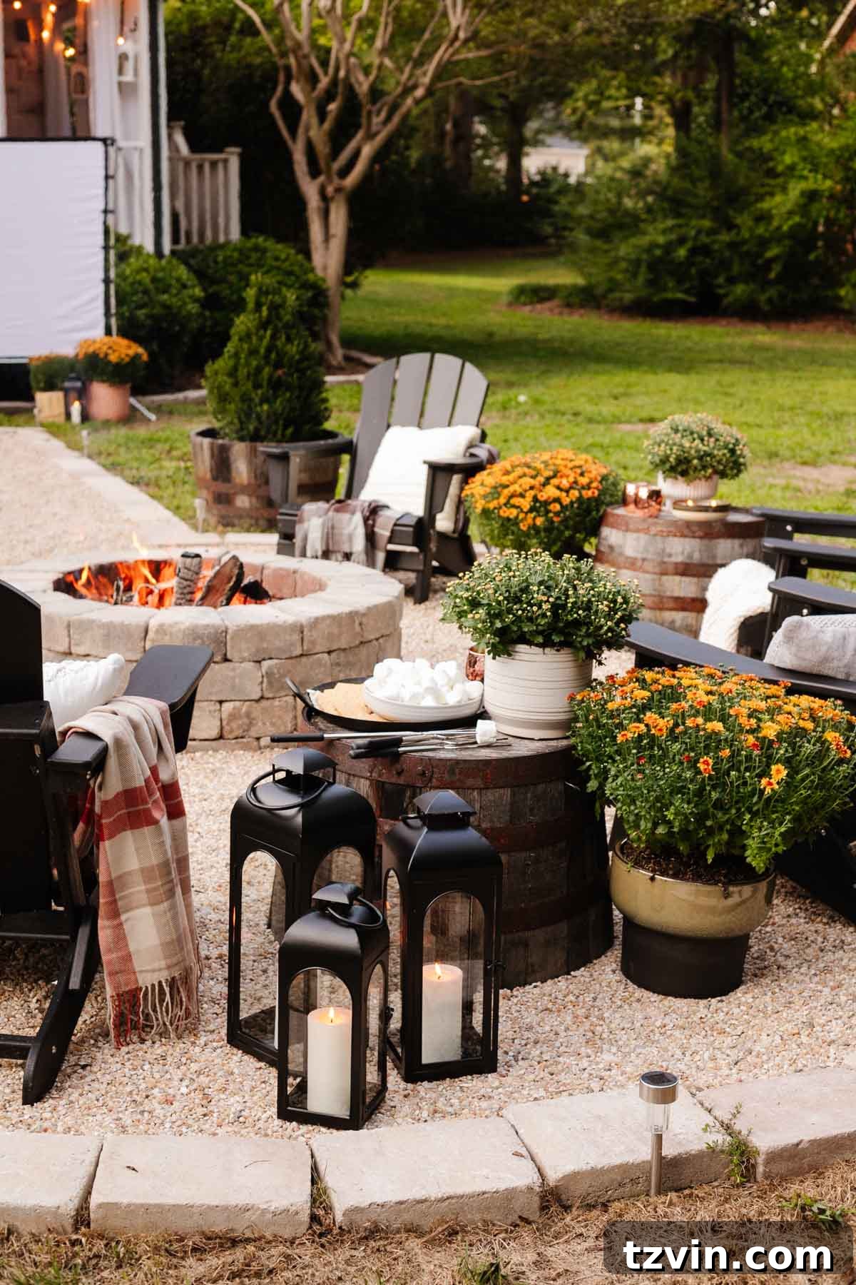 Ignite the Night: 10 Tips for Your Best Bonfire Party Ever 5 fall bonfire party with s'mores, blankets, and lanterns