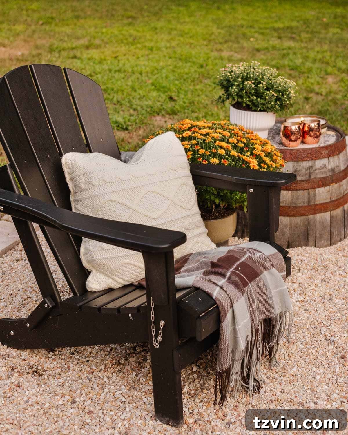 Ignite the Night: 10 Tips for Your Best Bonfire Party Ever 7 blanket and pillow on an adirondack chair