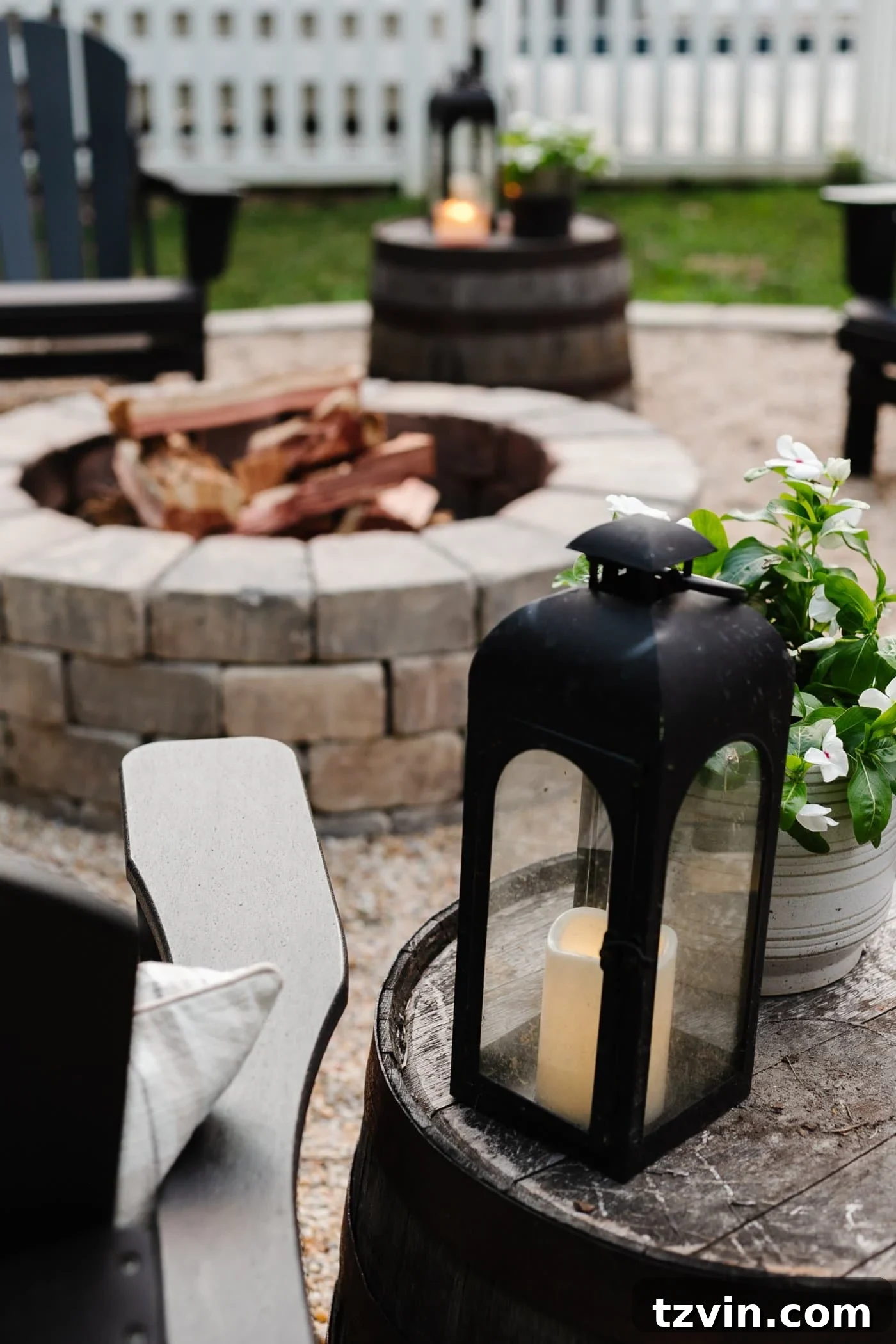 Ignite the Night: 10 Tips for Your Best Bonfire Party Ever 8 lantern beside a backyard fire pit