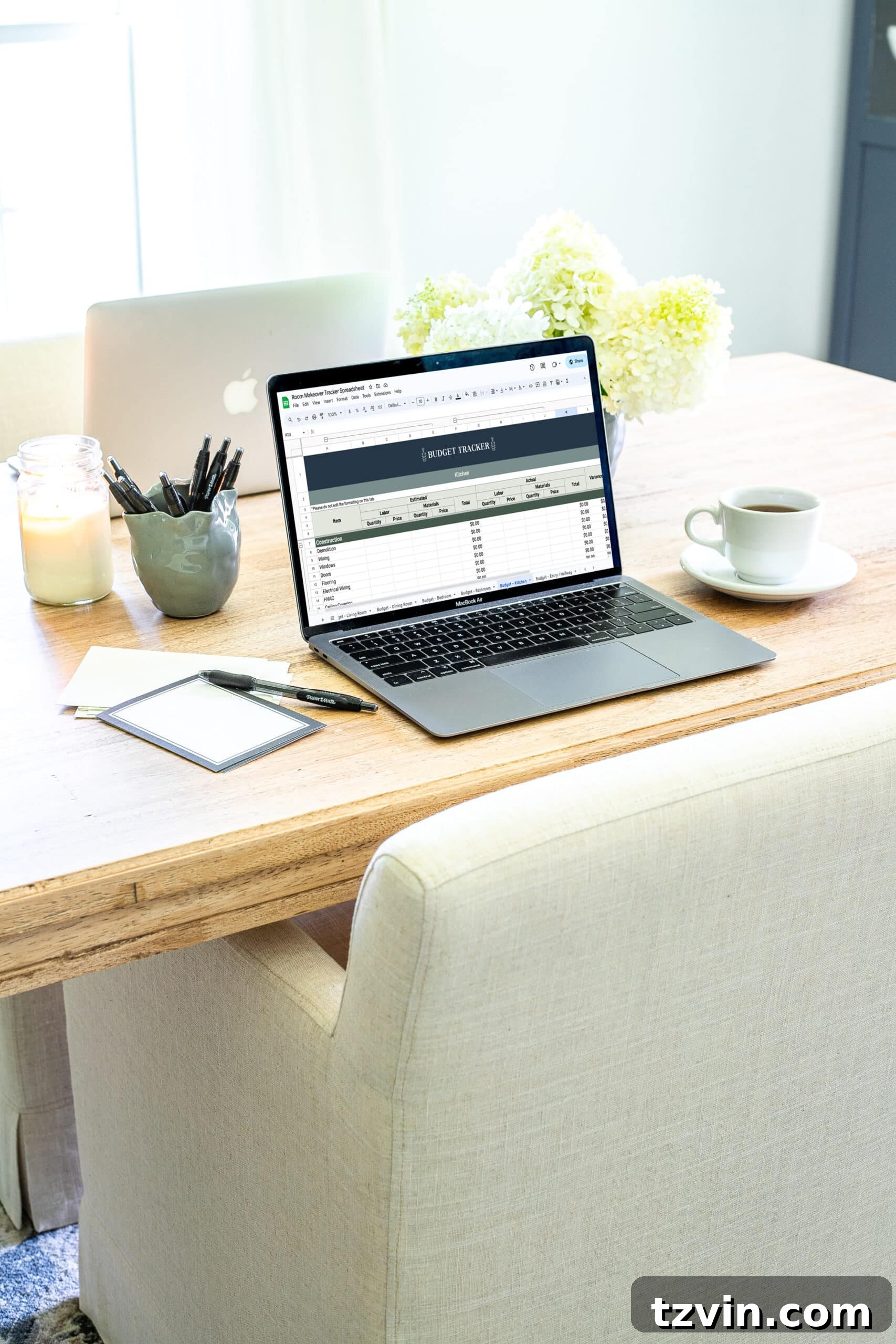 Design Your Perfect Room Makeover: 3 Indispensable Planning Tools 5 laptop with remodel budget tracking spreadsheet