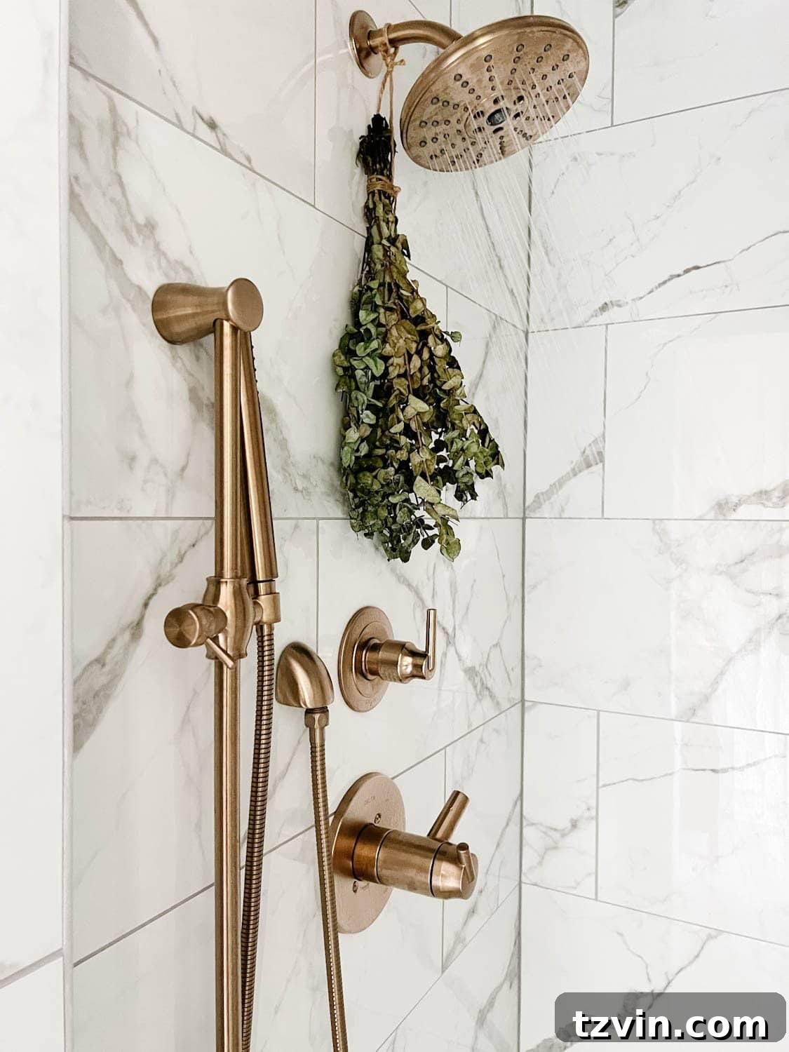 14 Brilliant Hacks to Make Your Small Bathroom Feel Spacious 20 A modern spa-like bathroom with large format tiles in the shower area, emphasizing minimal grout lines and reflection.