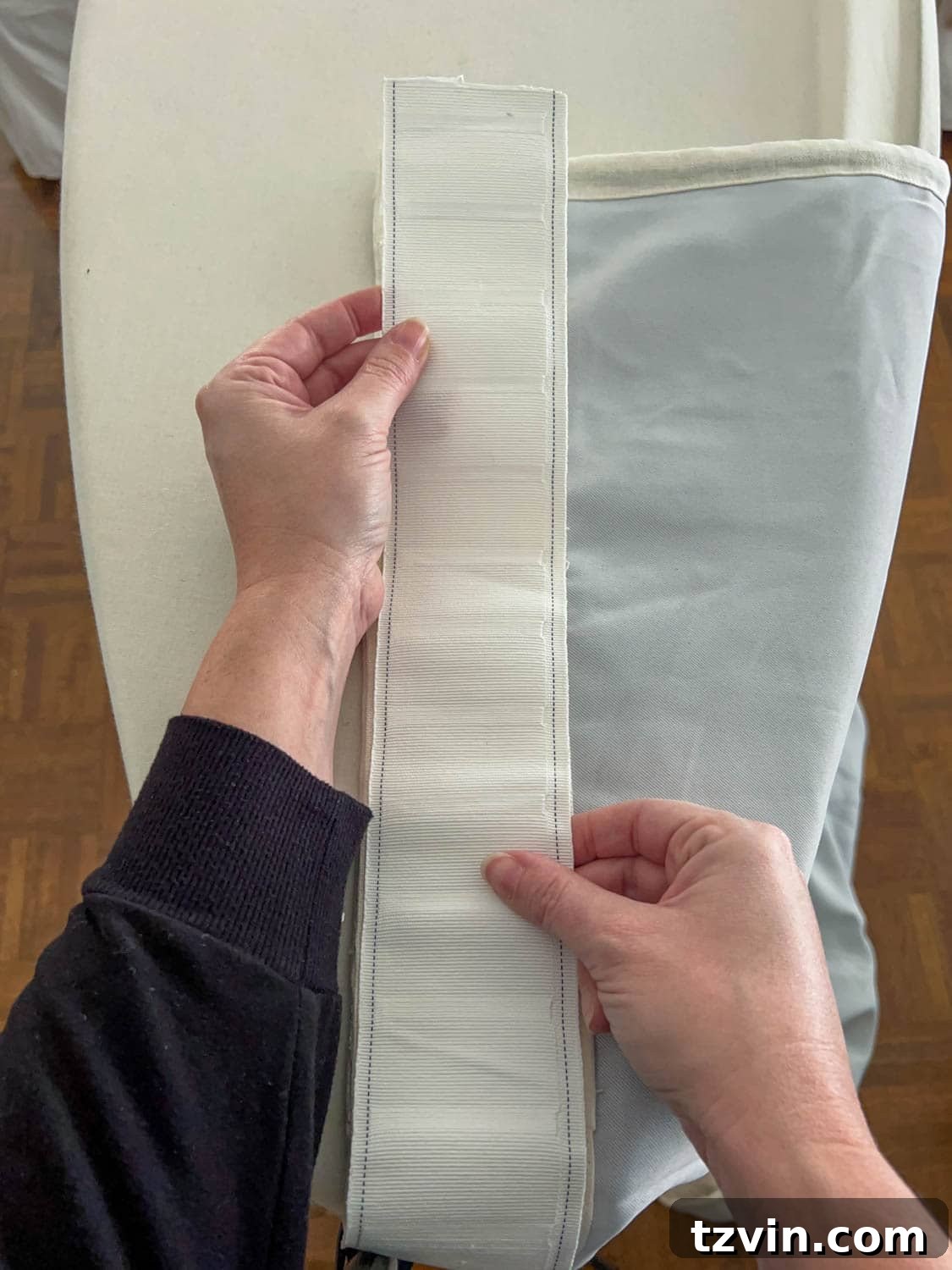 Chic No-Sew Curtains: Easy DIY with Designer Trim 7 Close-up of header tape laid on a curtain panel, ready for attachment