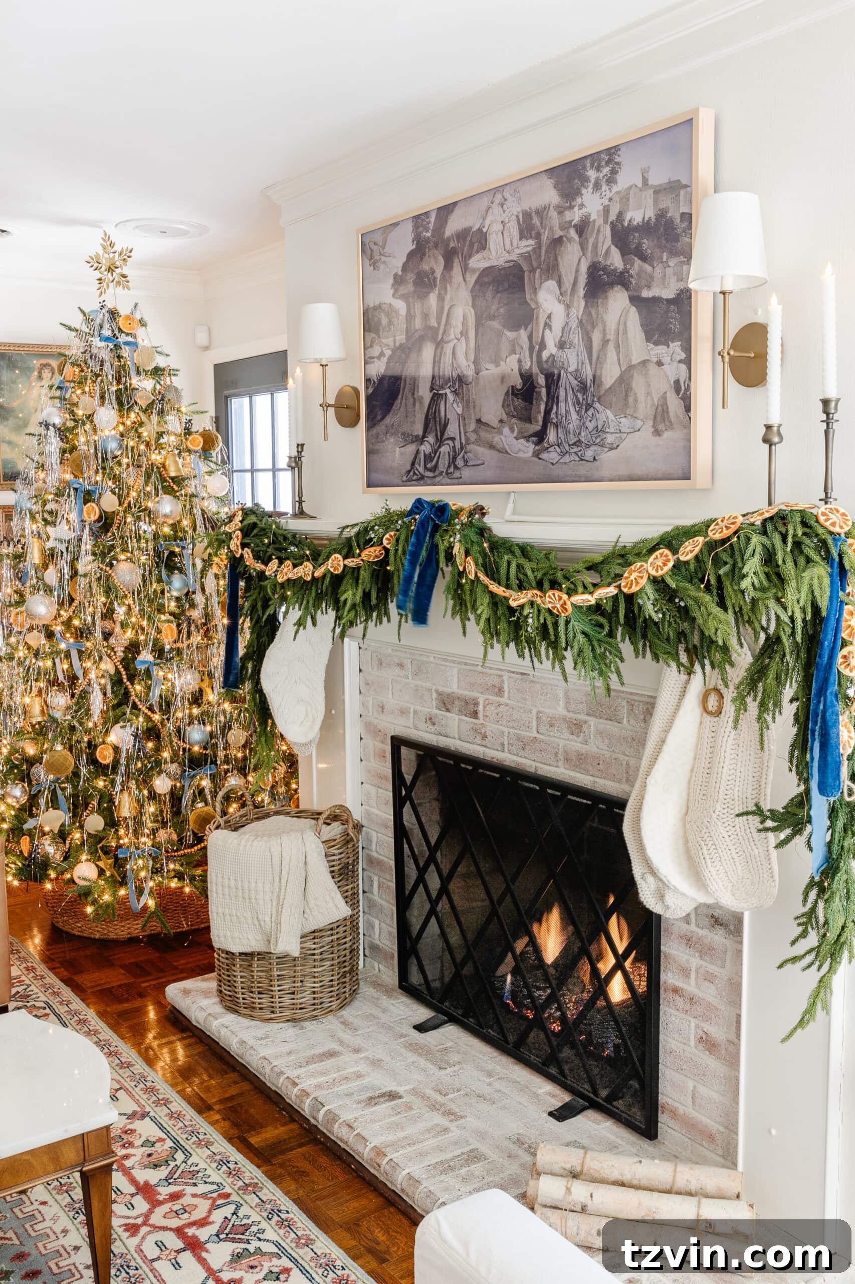 A beautifully decorated Christmas mantel featuring realistic Norfolk pine garland, creating an elegant and festive atmosphere in the living room.