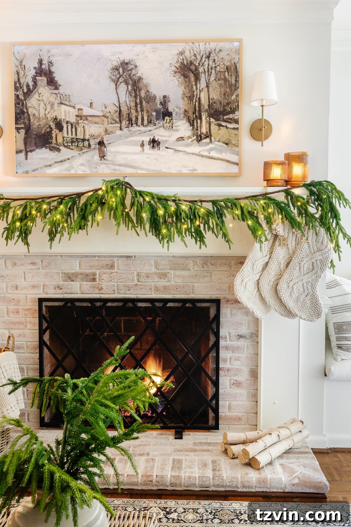 A simple and minimalist Christmas mantel featuring a lush pine garland beautifully adorned with delicate fairy lights, exuding serene holiday elegance.