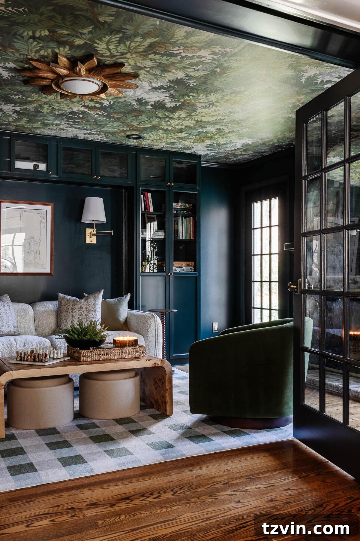 Your Dream Home Cinema DIY on a Dime 27 media room makeover with built in bookshelves French doors and fireplace