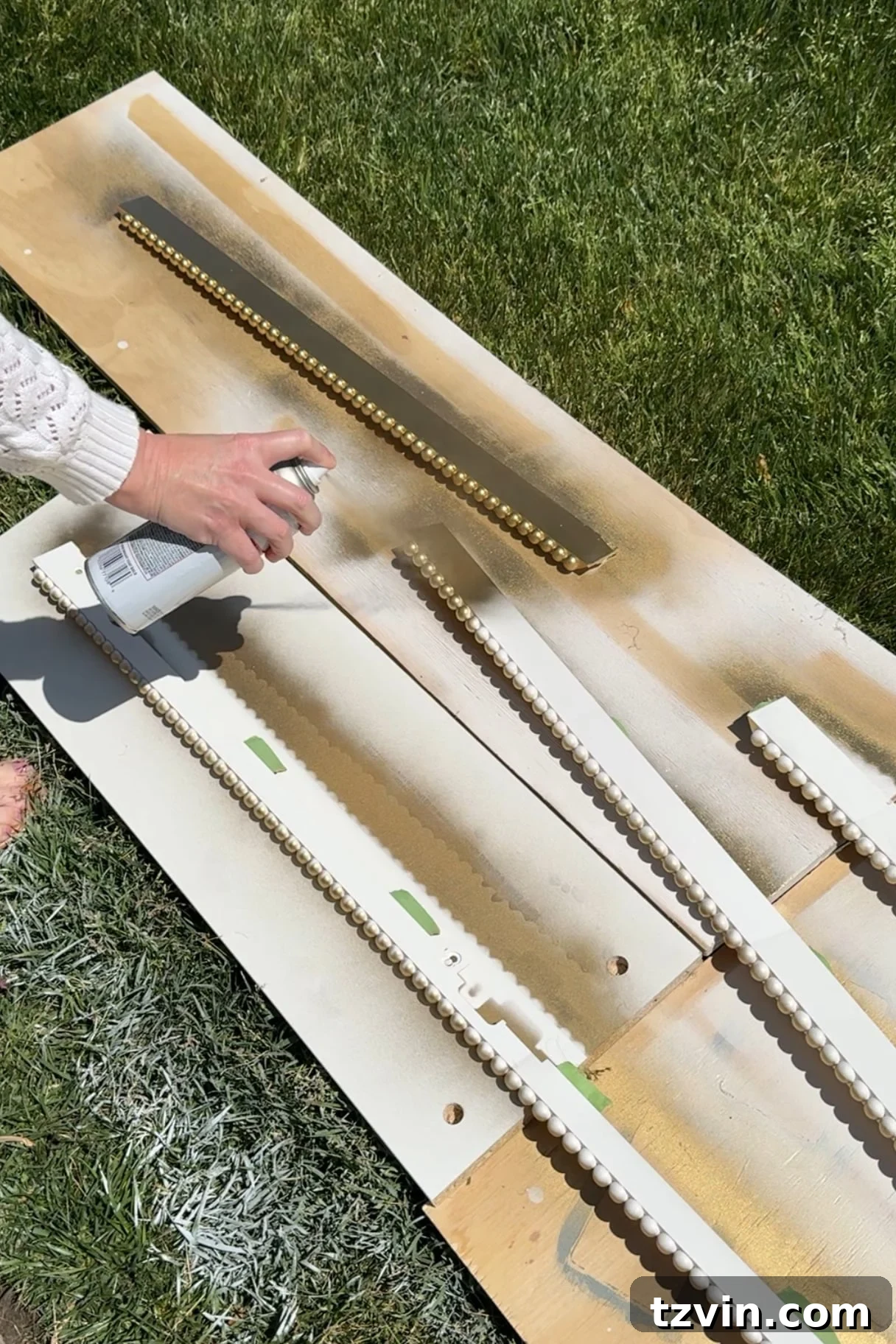 DIY Bobbin Bezel for Samsung Frame TV 7 painting tv frame with gold spray paint