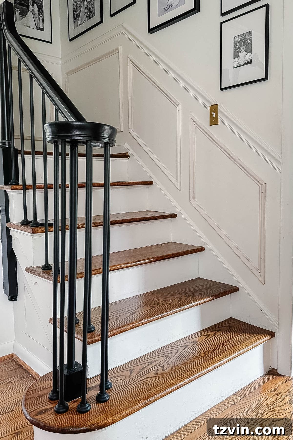Stair Wainscoting Made Simple: A DIY Installation 15 Finished picture frame molding stair wainscoting adding elegance to the staircase