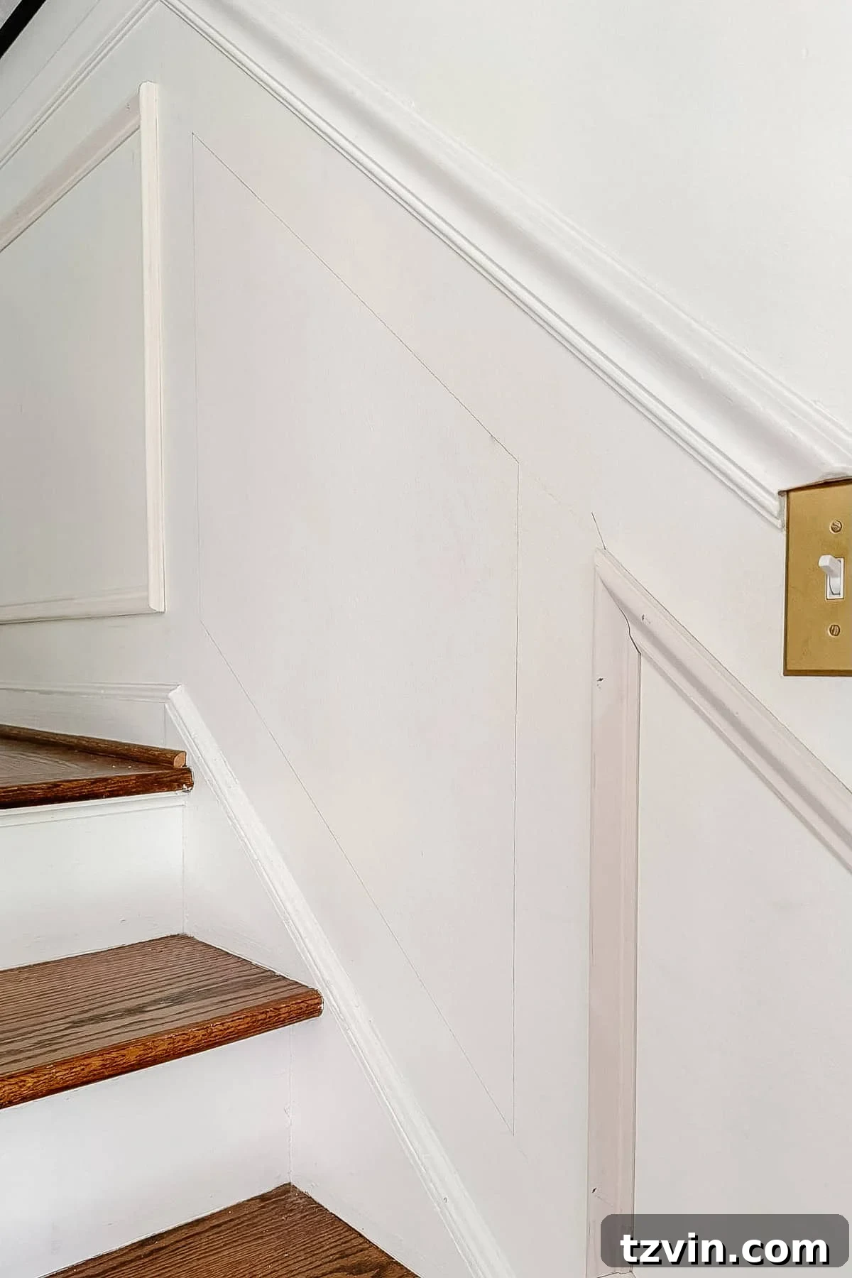 Stair Wainscoting Made Simple: A DIY Installation 4 Pencil markings on stairs indicating layout for molding installation