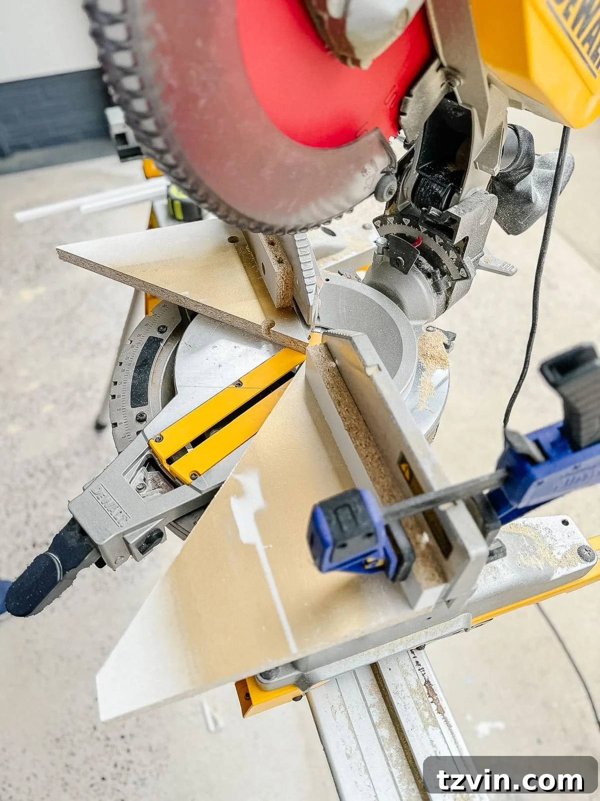 Stair Wainscoting Made Simple: A DIY Installation 7 DIY wainscoting installation utilizing a miter saw guide for accurate cuts