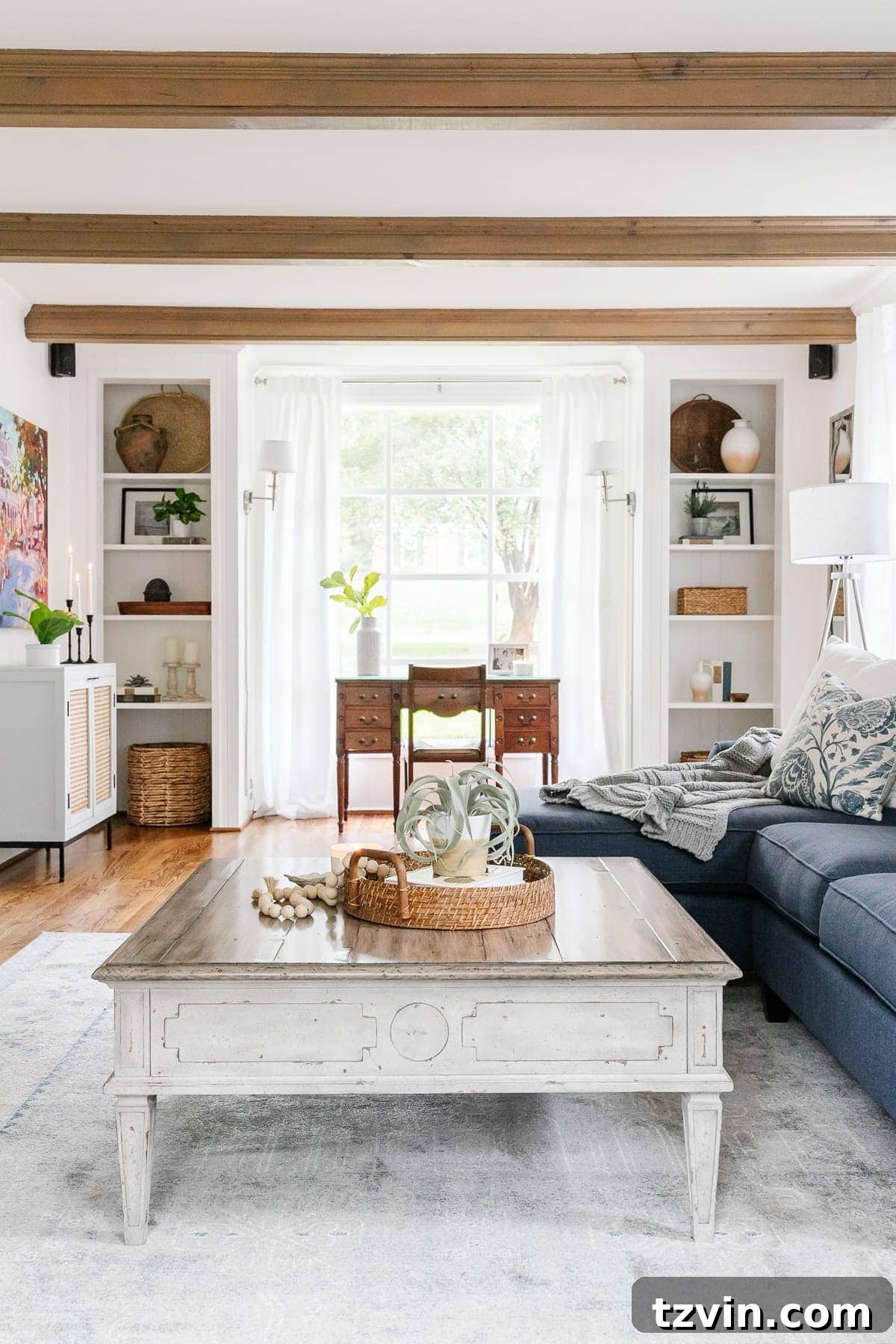 Boost Your Output: Smart Home Office Designs 15 Elegant modern coastal living room that seamlessly blends with an office hybrid space, showcasing versatile design