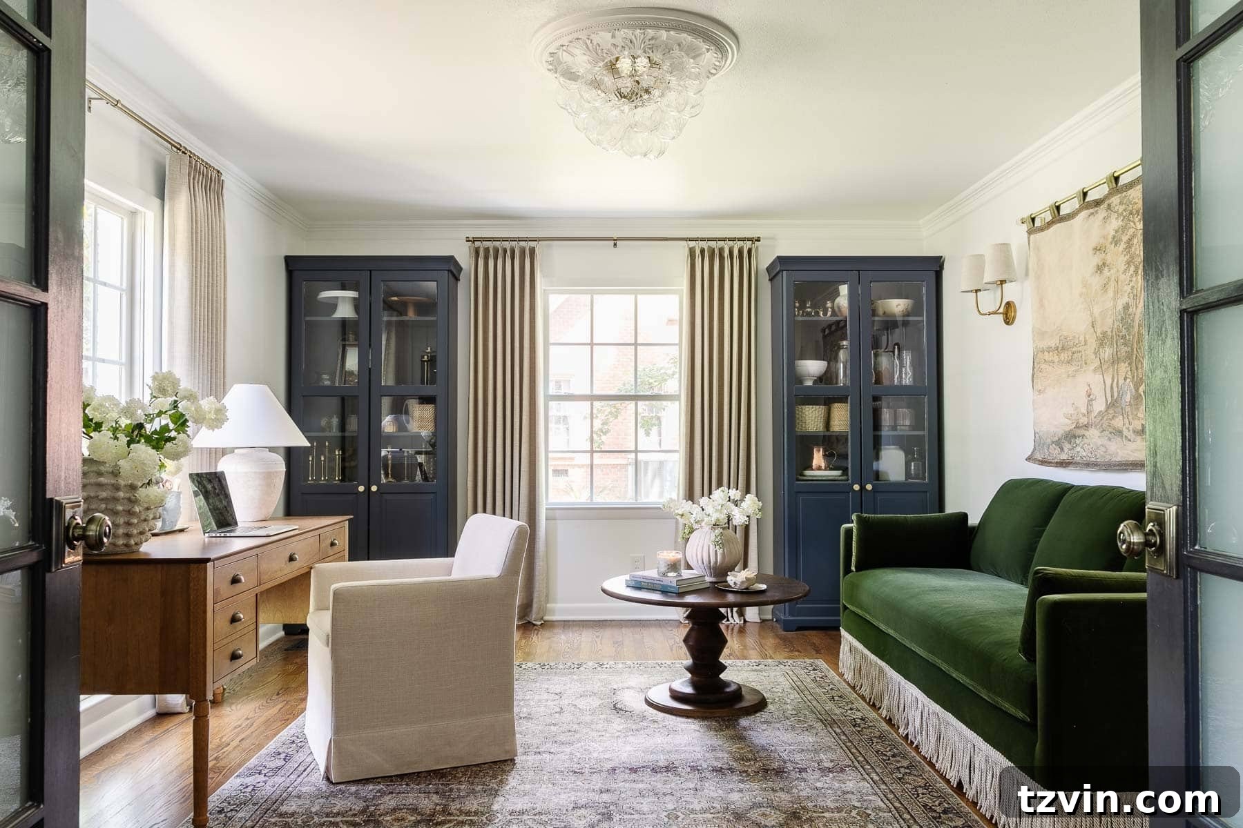 Boost Your Output: Smart Home Office Designs 4 Comfortable home office layout featuring a desk placed in front of a window and a stylish sofa