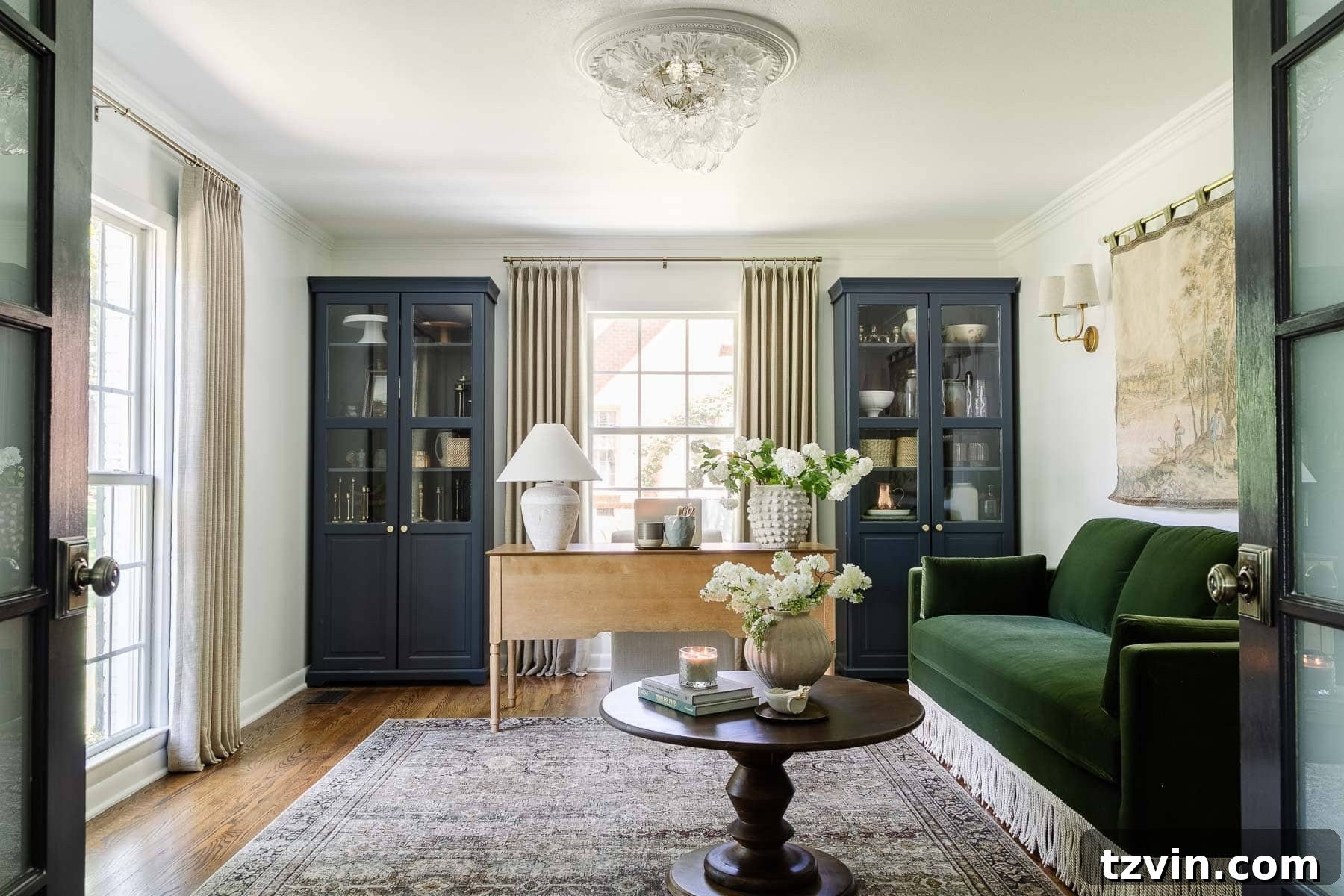 Boost Your Output: Smart Home Office Designs 5 Elegant home office layout designed for client meetings, featuring a desk facing a sofa