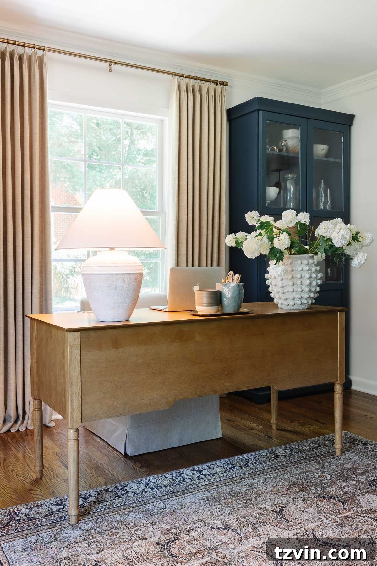 Boost Your Output: Smart Home Office Designs 8 Sophisticated home office desk setup, ideal for client interactions, with ambient lighting