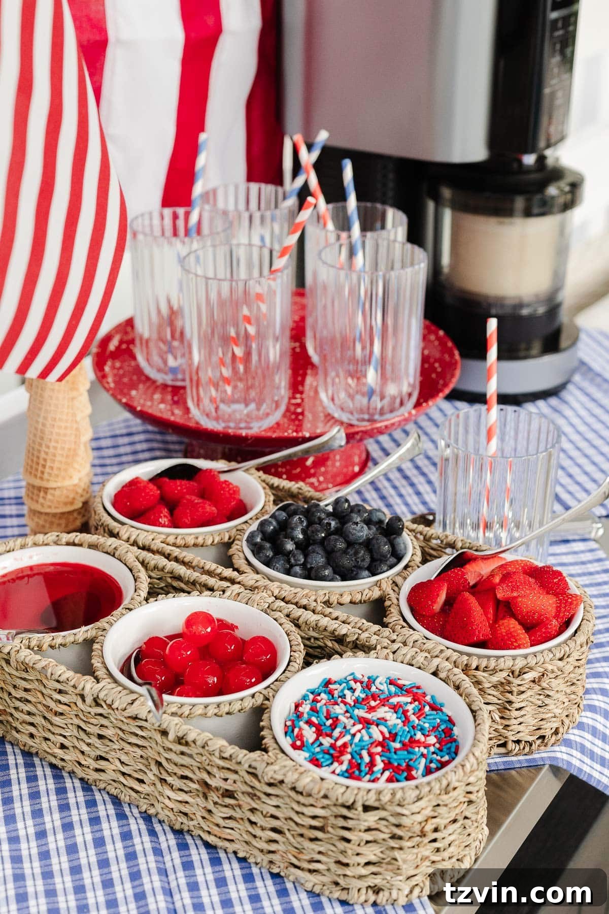 Stars and Stripes Sundae Station Made Easy 7 Fourth of July ice cream bar featuring a festive array of red, white, and blue toppings.