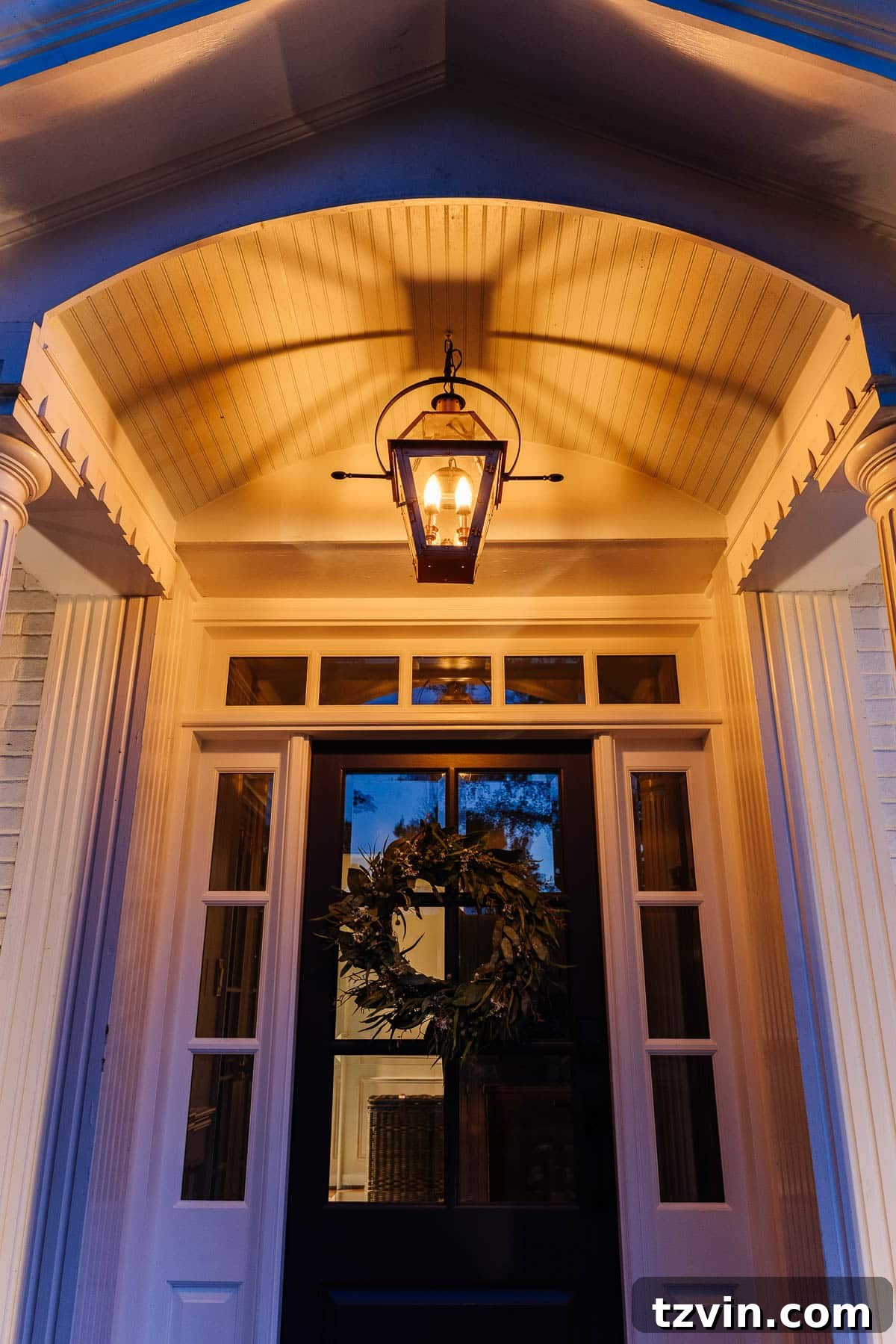 Top 4 Flame Effect Light Bulbs for a Realistic Gas Lantern Glow 8 fake gas lantern on a front porch with flickering flame light bulbs at night