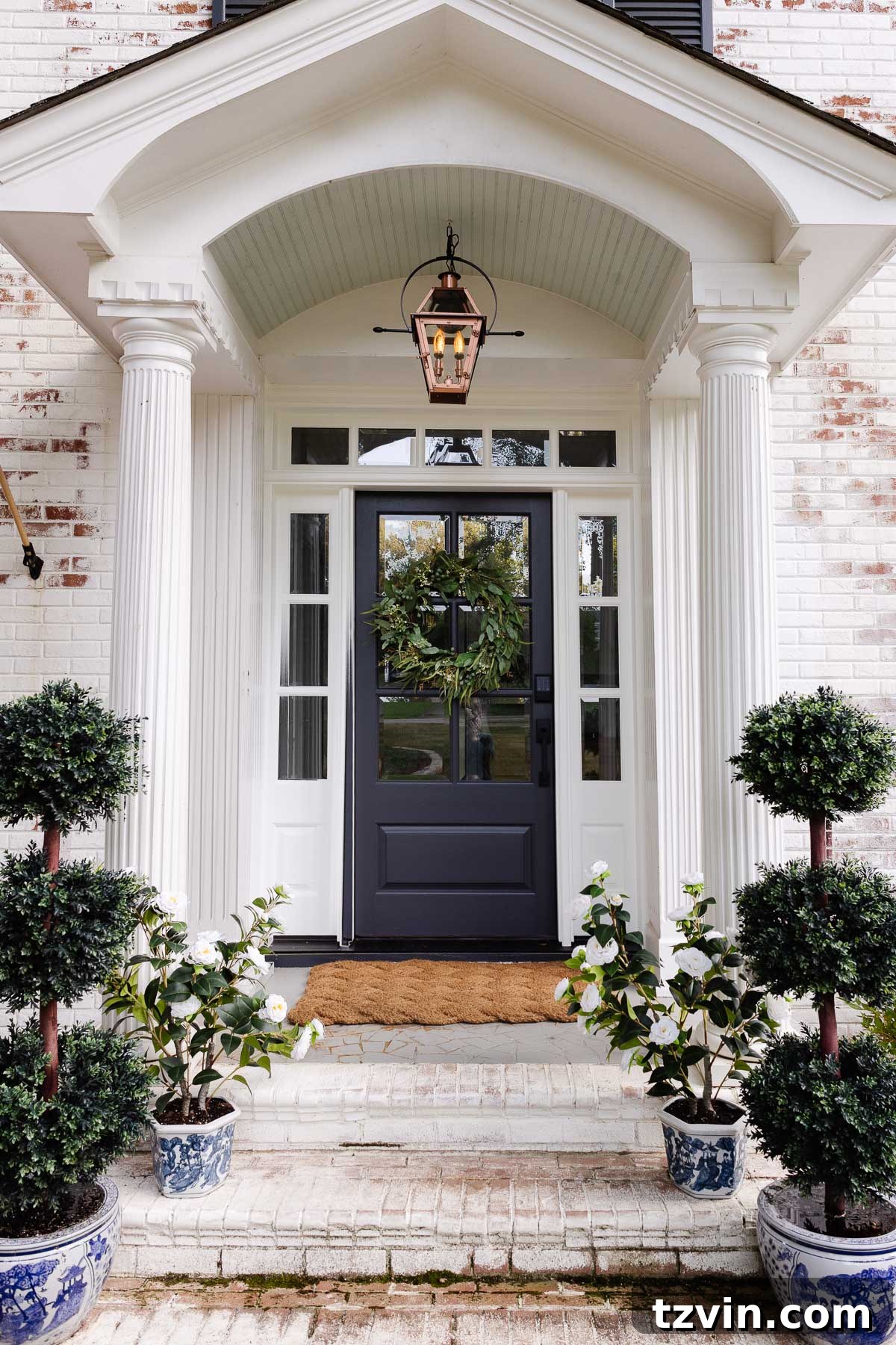 Top 4 Flame Effect Light Bulbs for a Realistic Gas Lantern Glow 9 fake gas lantern on a front porch with flickering flame light bulbs in daylight