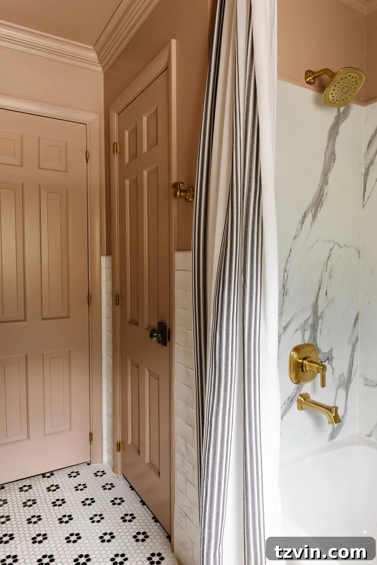 A stylish bathroom featuring a high-hung, extra-long shower curtain in a light fabric, adding visual height and softness to the space. The curtain beautifully drapes, enhancing the room's luxurious appeal.
