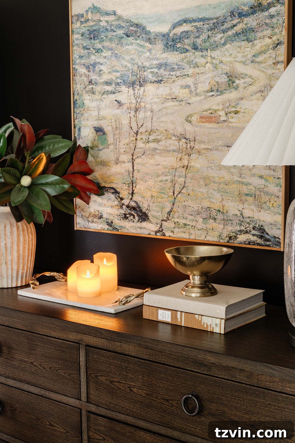 pedestal bowl used as a change holder on a bedroom dresser