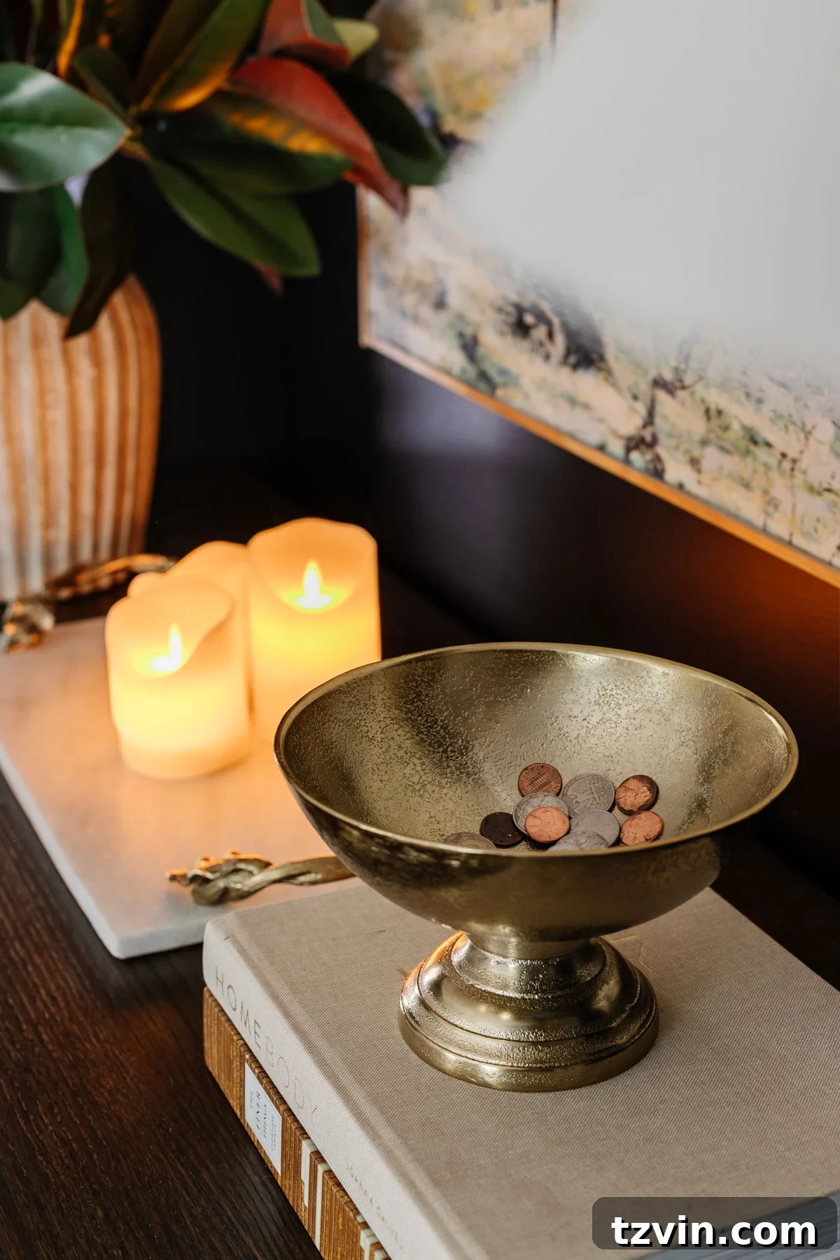 pedestal bowl used as a change holder on a bedroom dresser