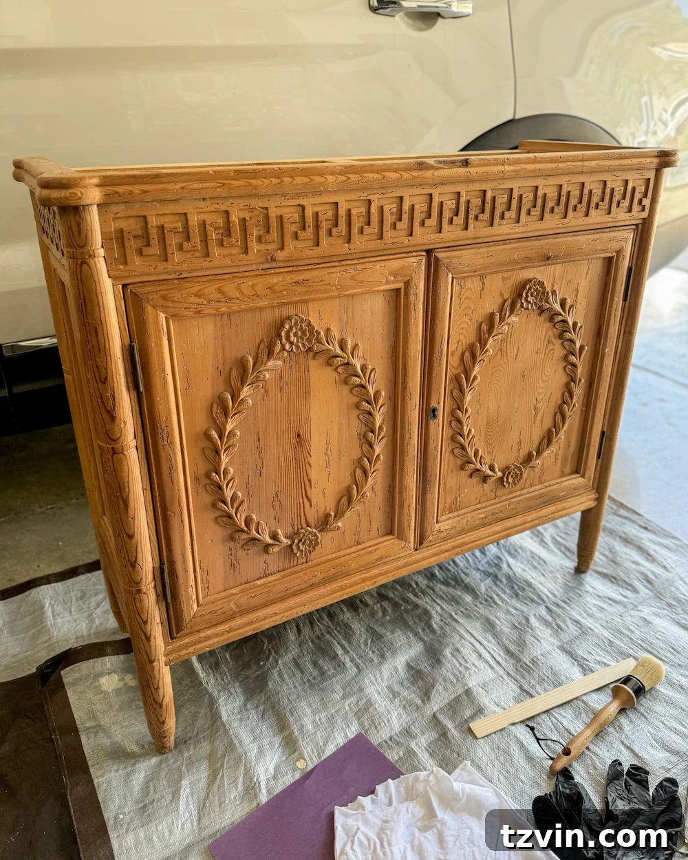 Renew Stained Furniture Without Sanding 2 Old orange wood foyer cabinet before gel stain application, showing its outdated finish.
