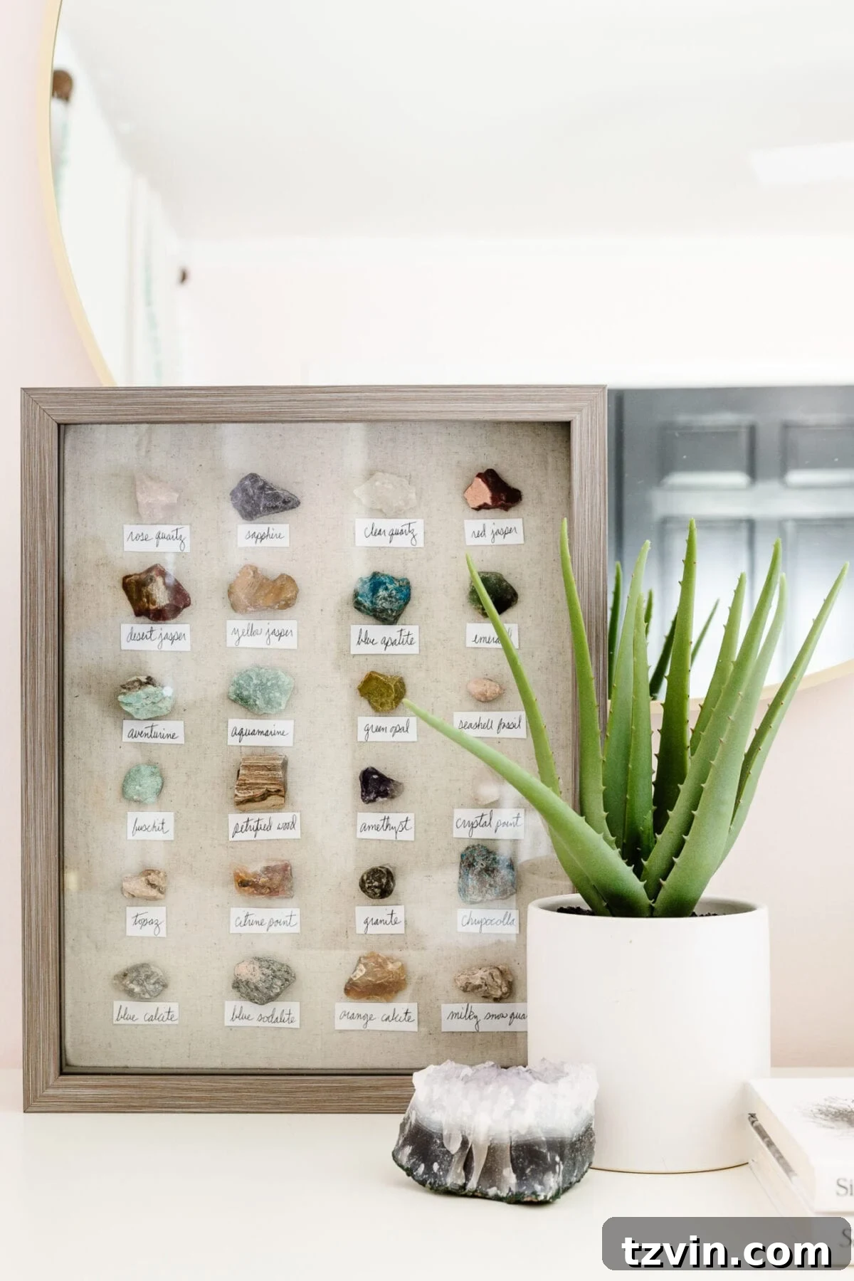 Rock collection display in a shadow box, offering cheap boho home decor with personal meaning.